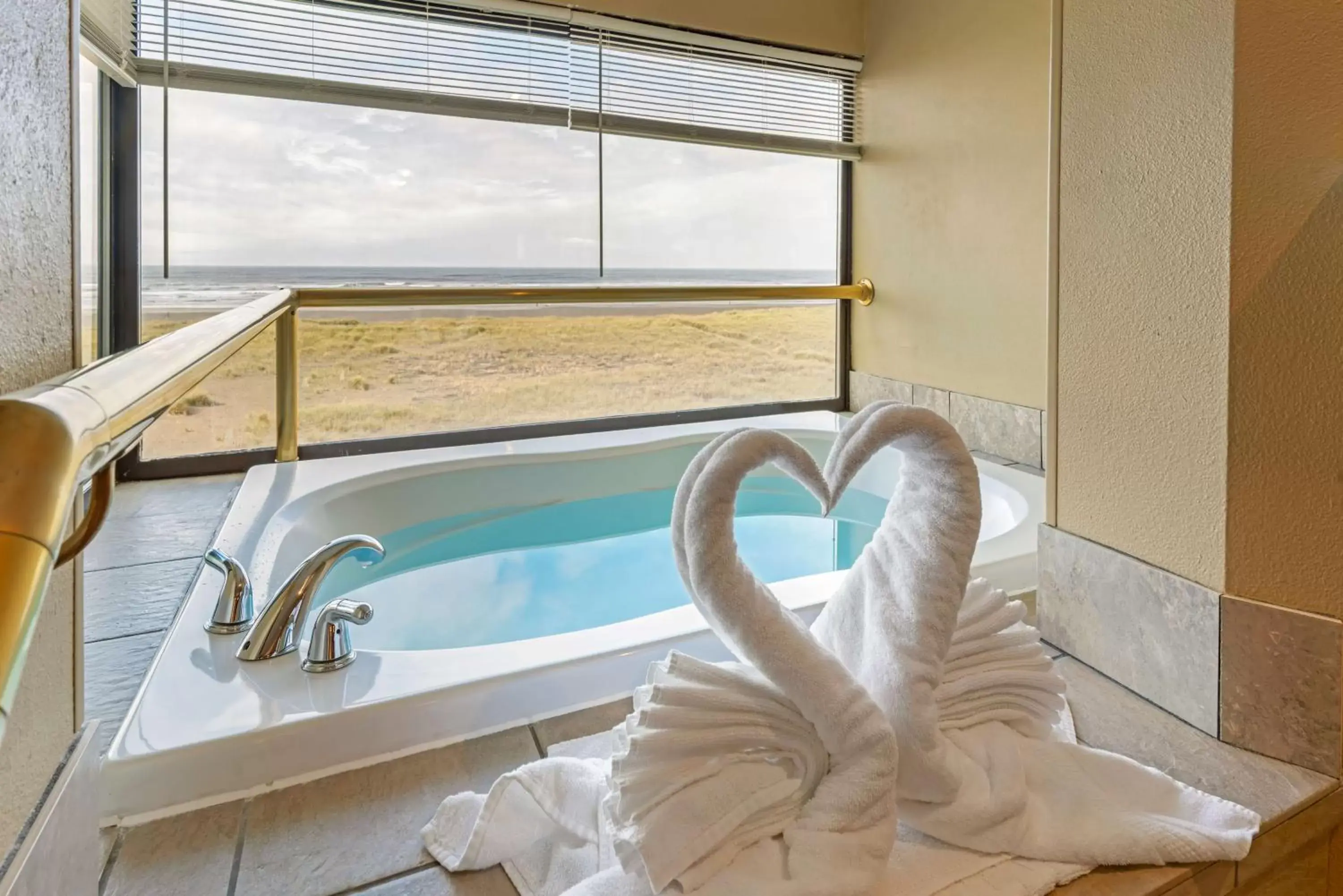 Bathroom, Swimming Pool in Best Western Plus Ocean View Resort