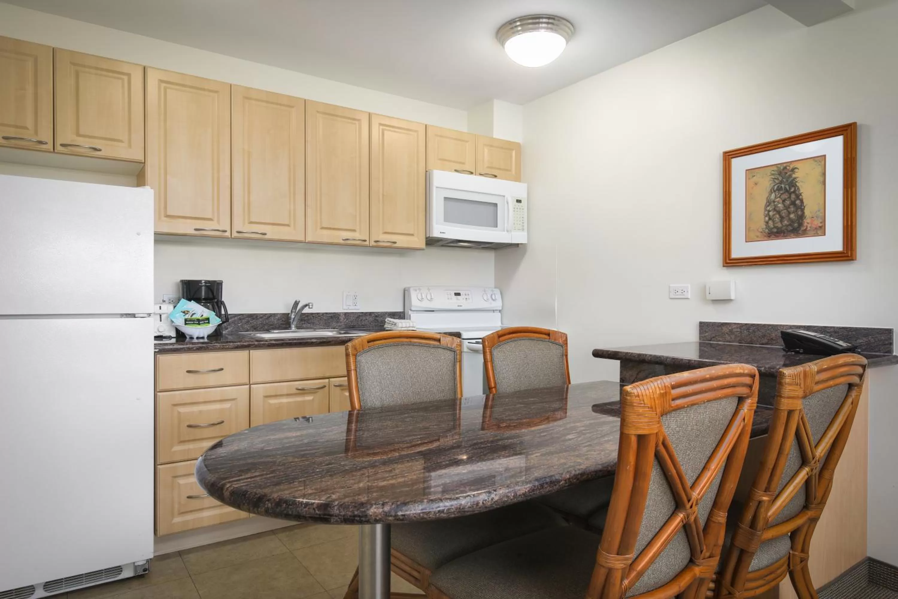 Kitchen or kitchenette in Aston Waikiki Sunset