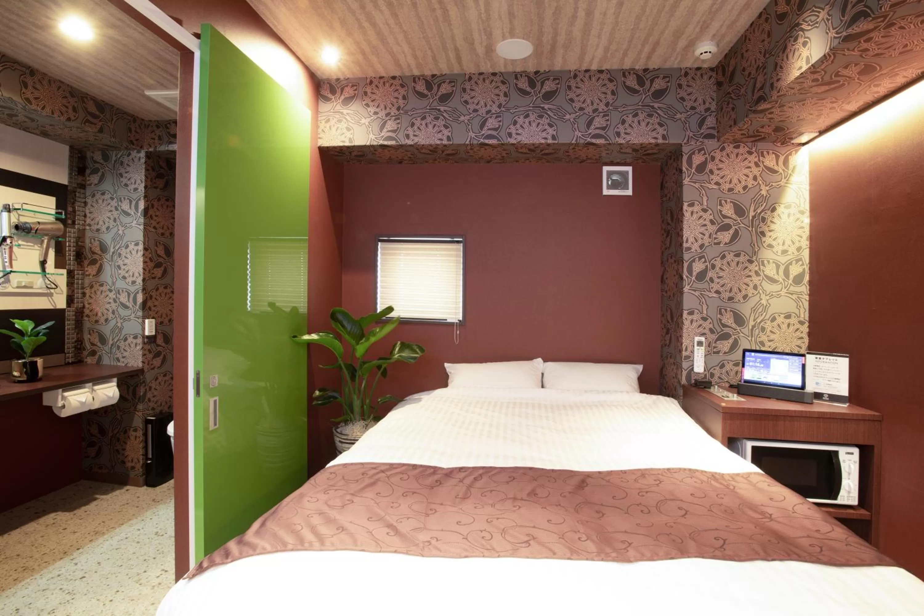 Bed in Hotel Xcell Hiroshima Nagarekawa