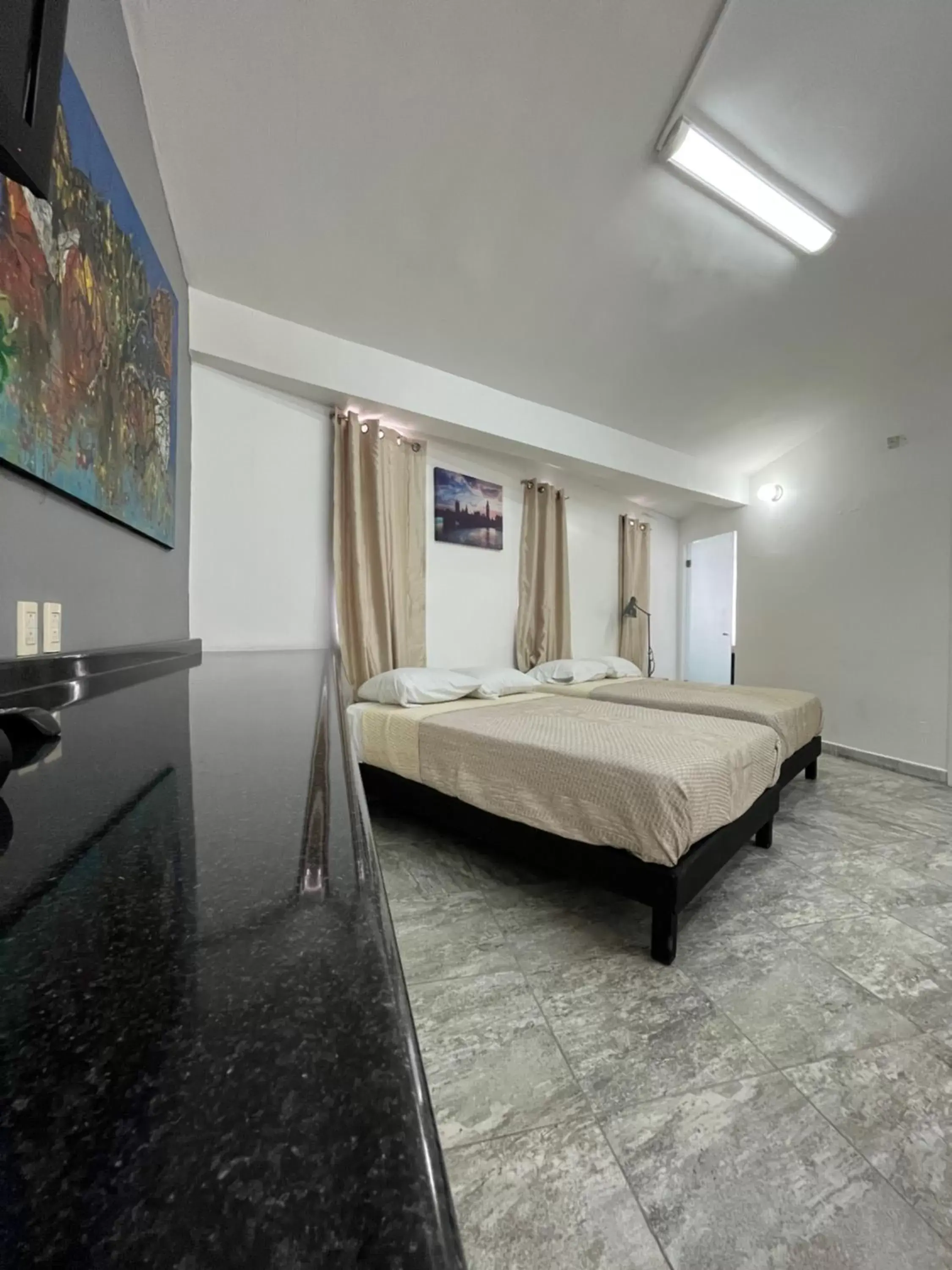 Bed in Genesis Suites / Lofts