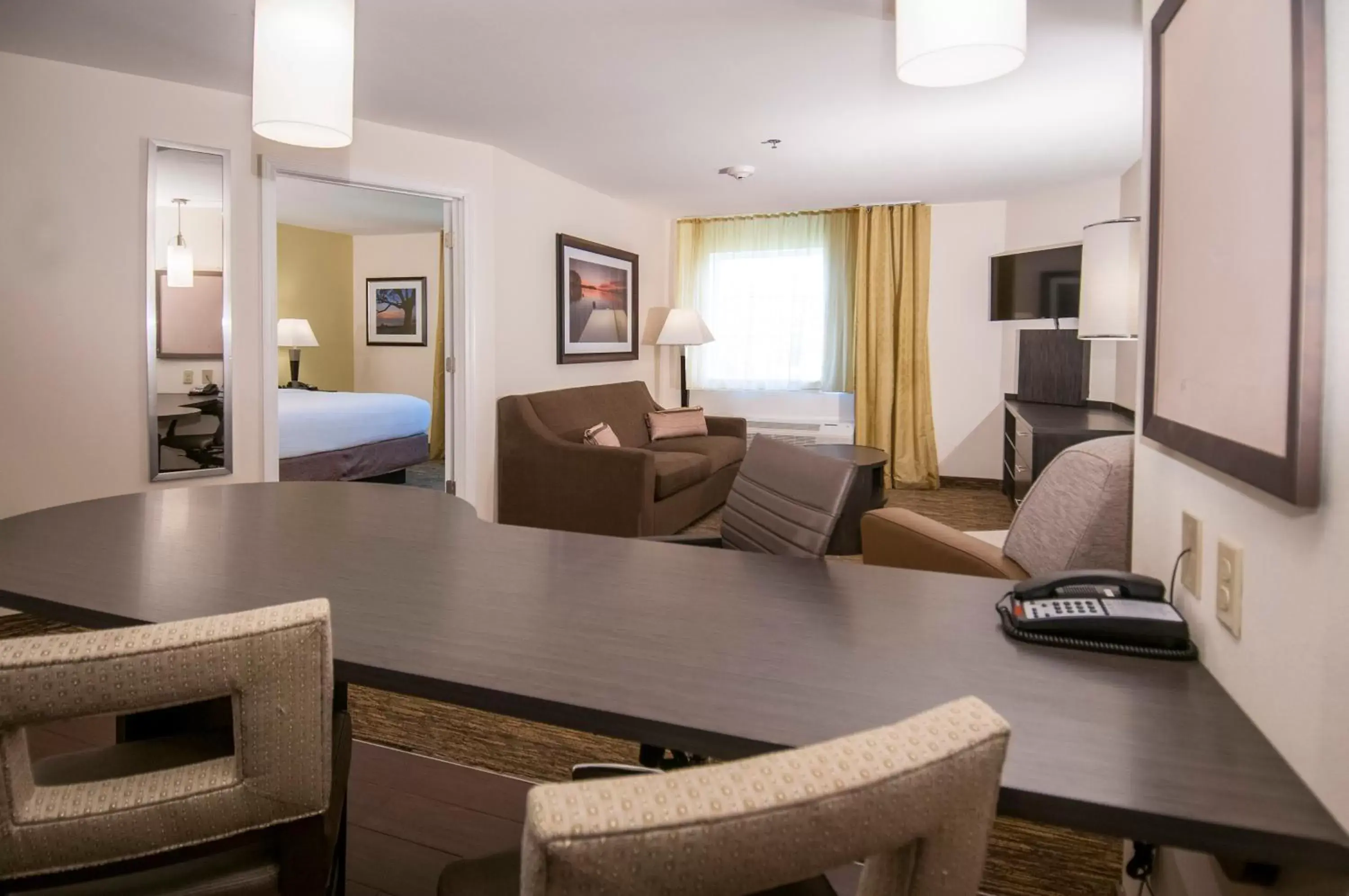 Photo of the whole room, Seating Area in Candlewood Suites - Baton Rouge - College Drive, an IHG Hotel