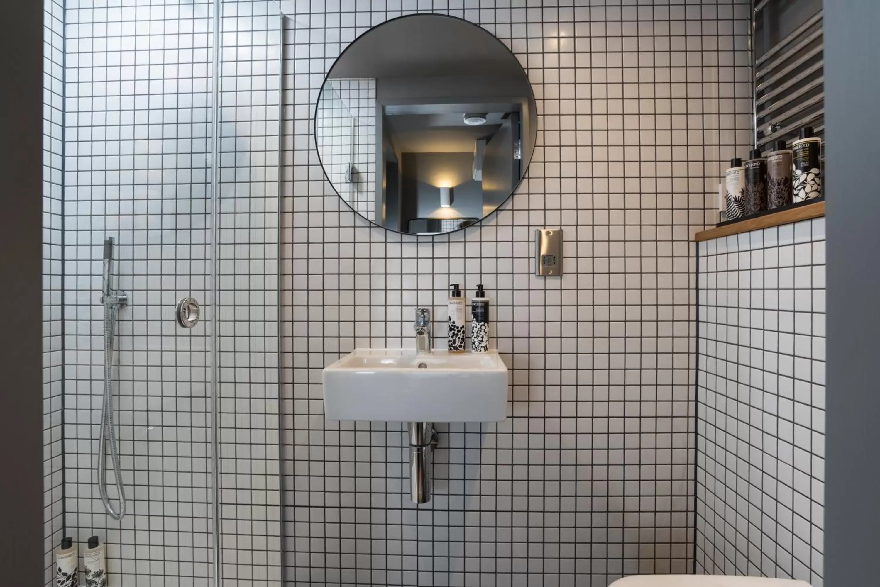Bathroom in Hiding Space - Trim Street Apartments