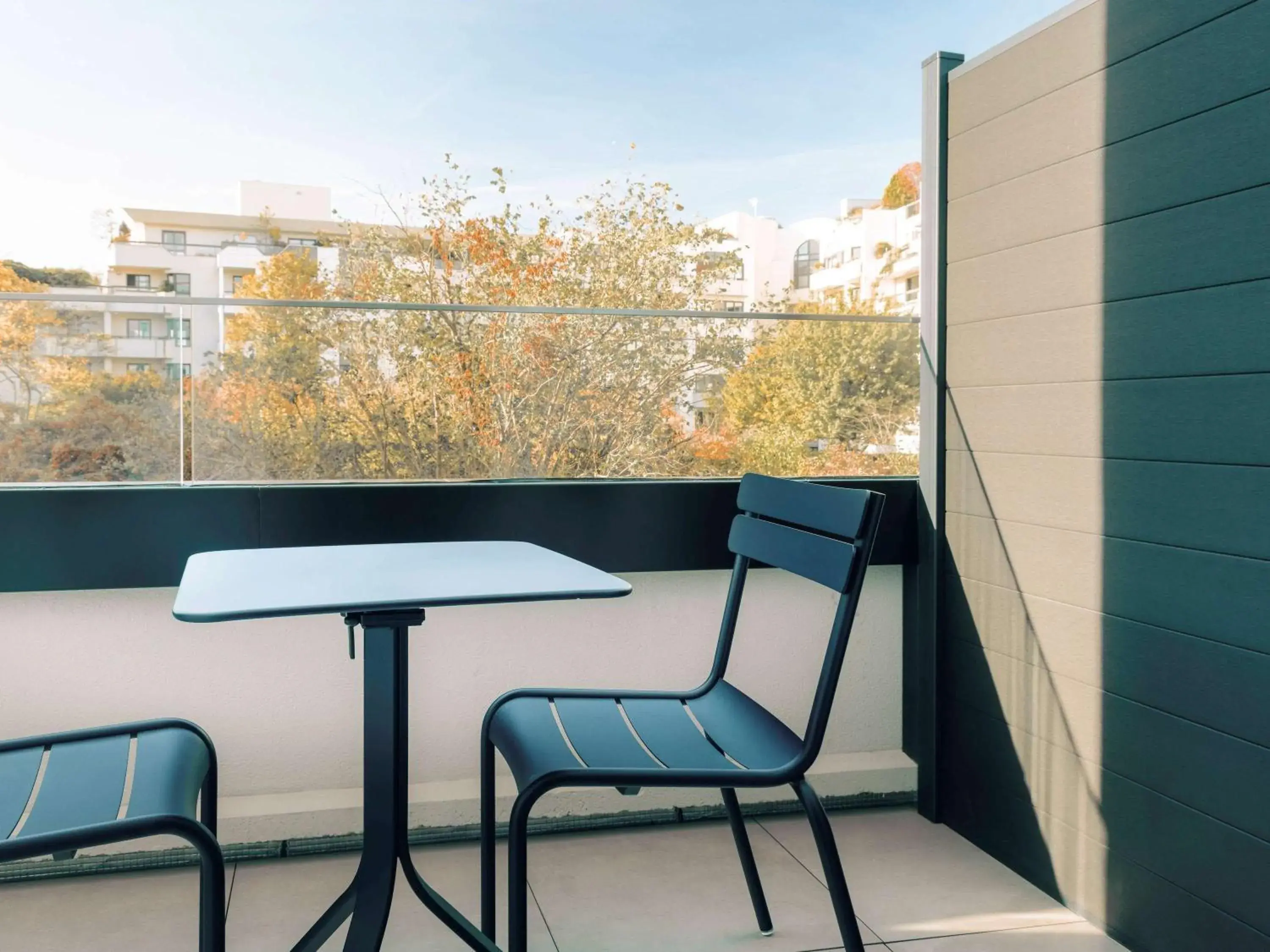 Bedroom in Novotel Paris Suresnes Longchamp