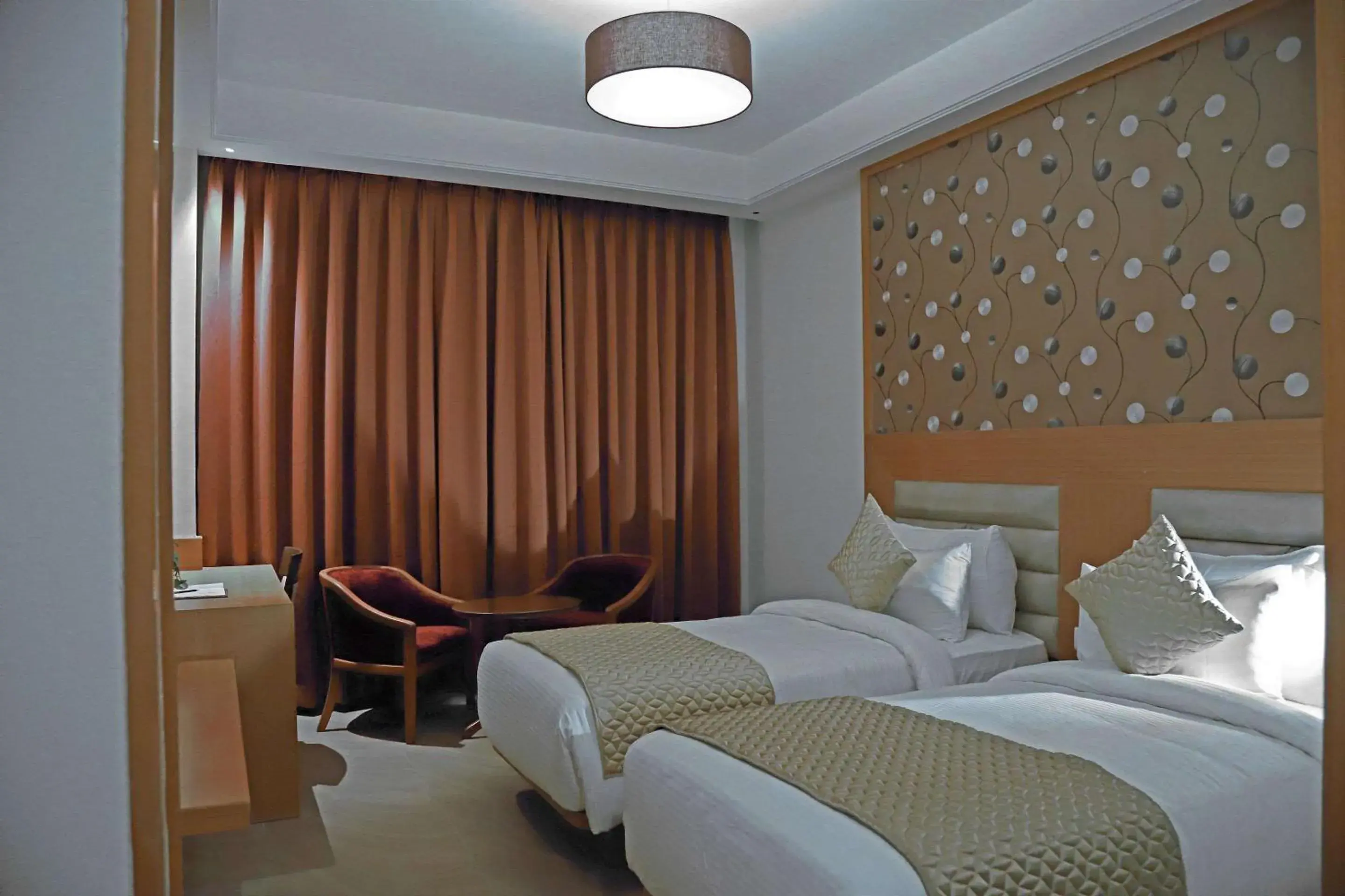 Photo of the whole room, Bed in Clarion Inn Indore