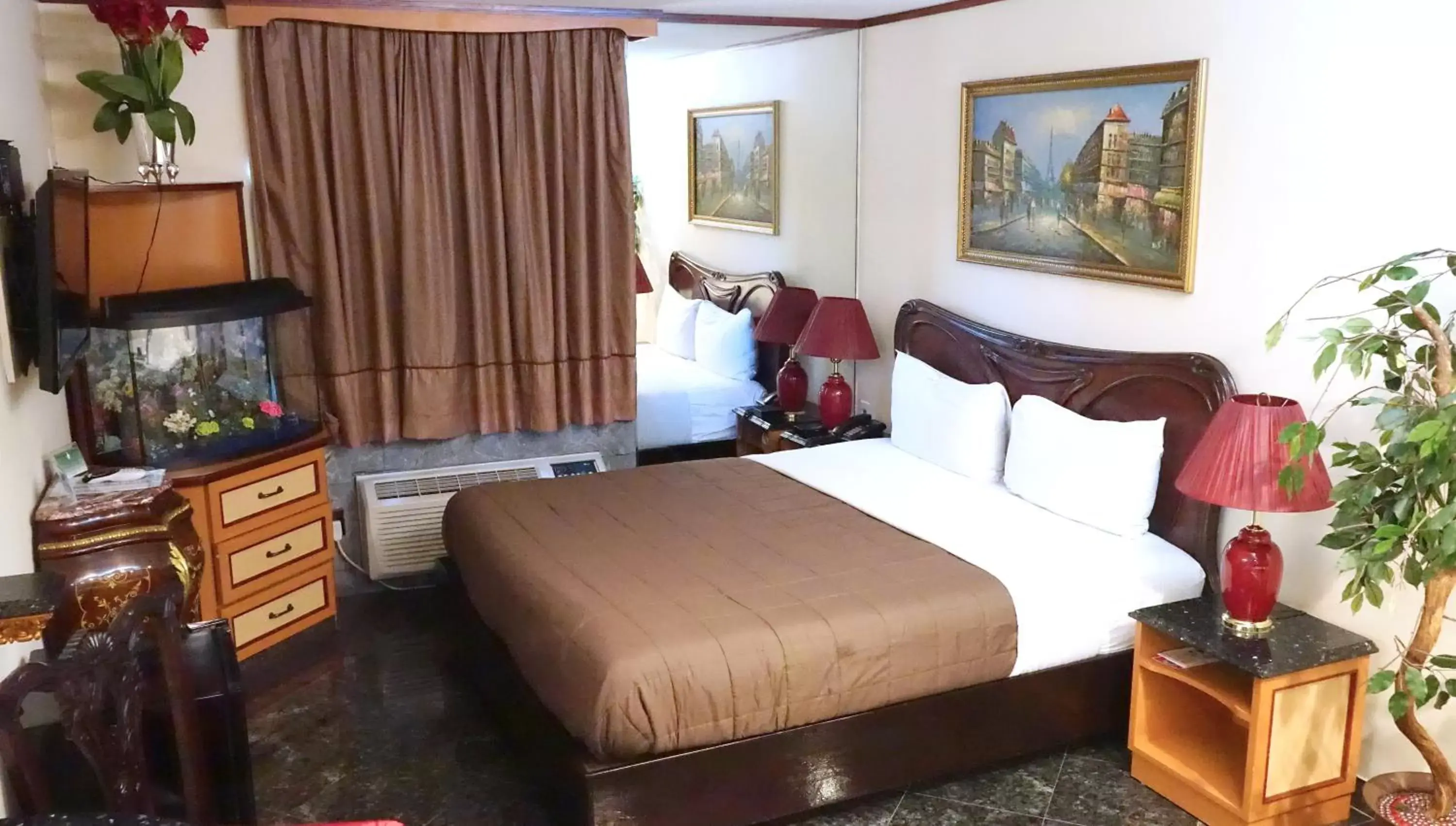 Bedroom in Paris Suites Hotel