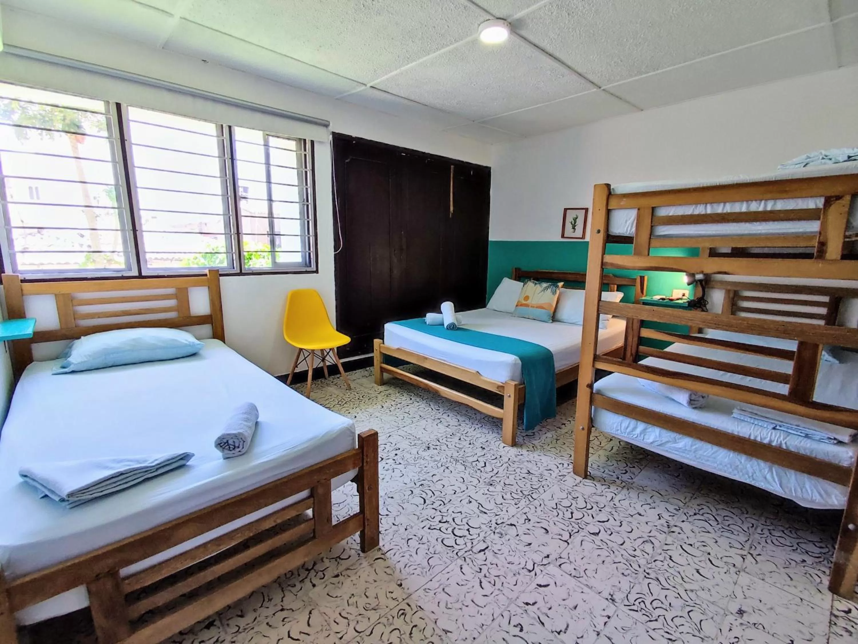 Bed in Bona Vida Hotel