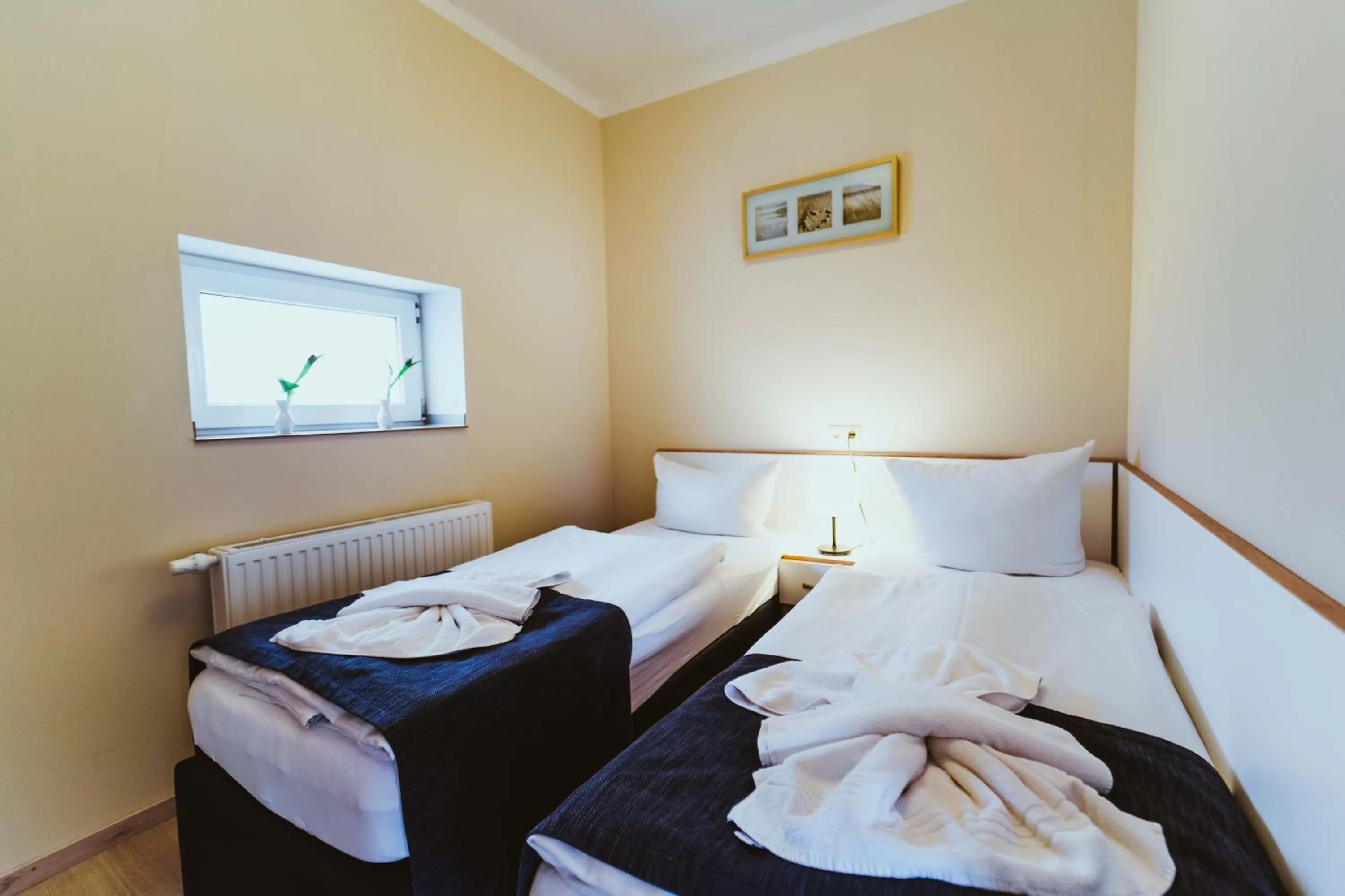 Bed in Aparthotel Stralsund Studios und Apartments