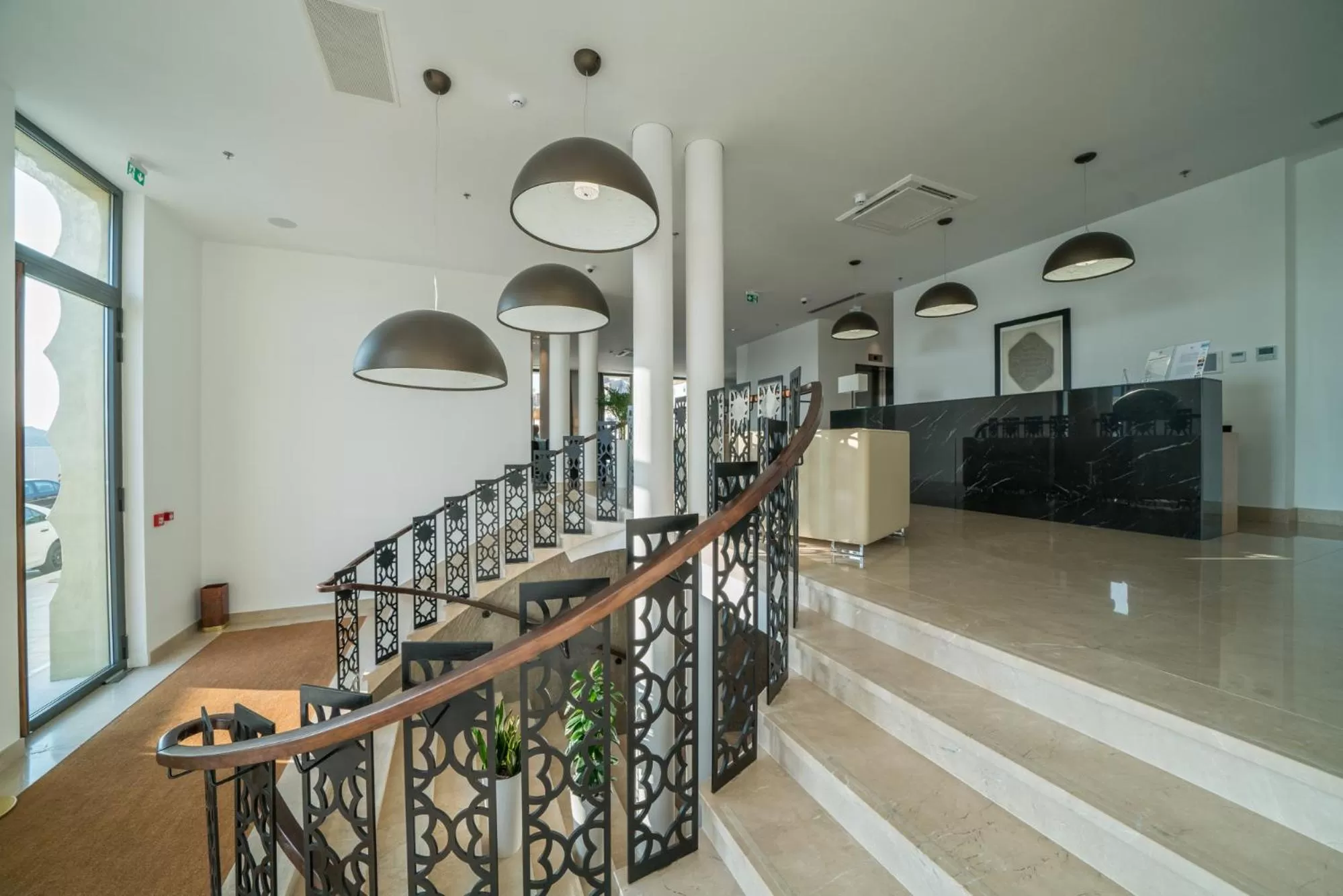 Lobby or reception in Bellevue Superior City Hotel