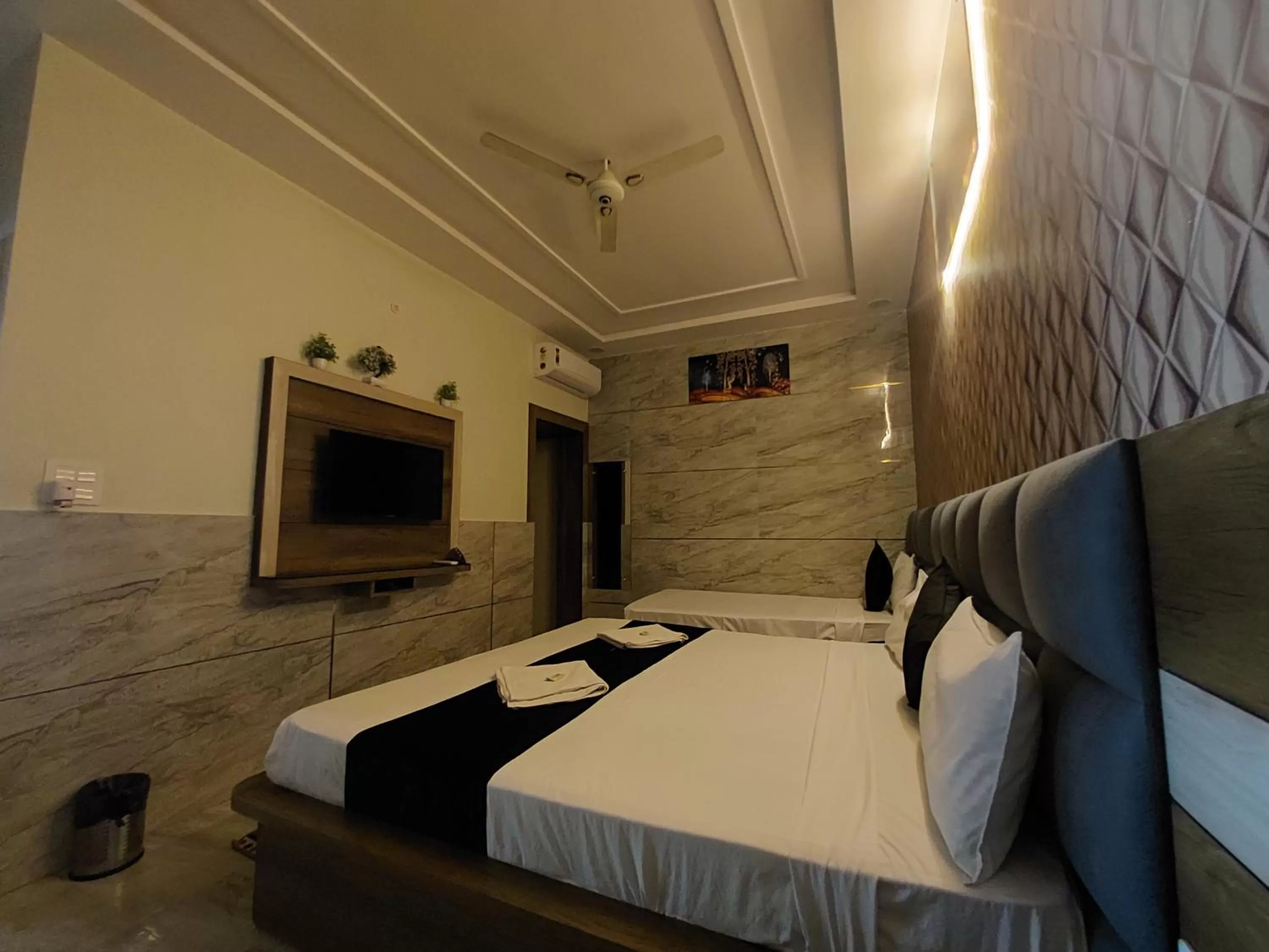 Bed in Taj Nice Point Manage by Taj Sunrise Group