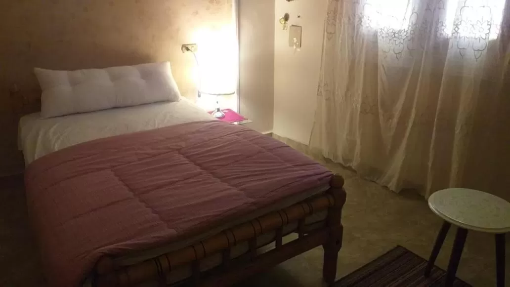 Bed in pyramid Giza city inn