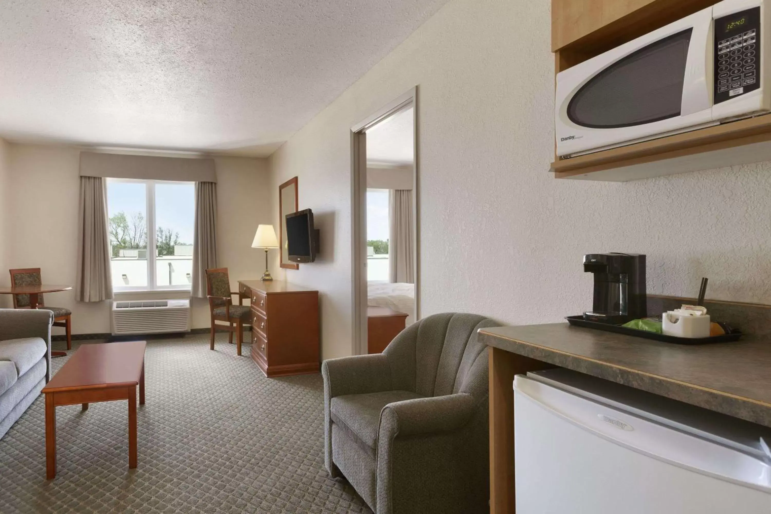 Photo of the whole room, Seating Area in Days Inn & Suites by Wyndham Winkler