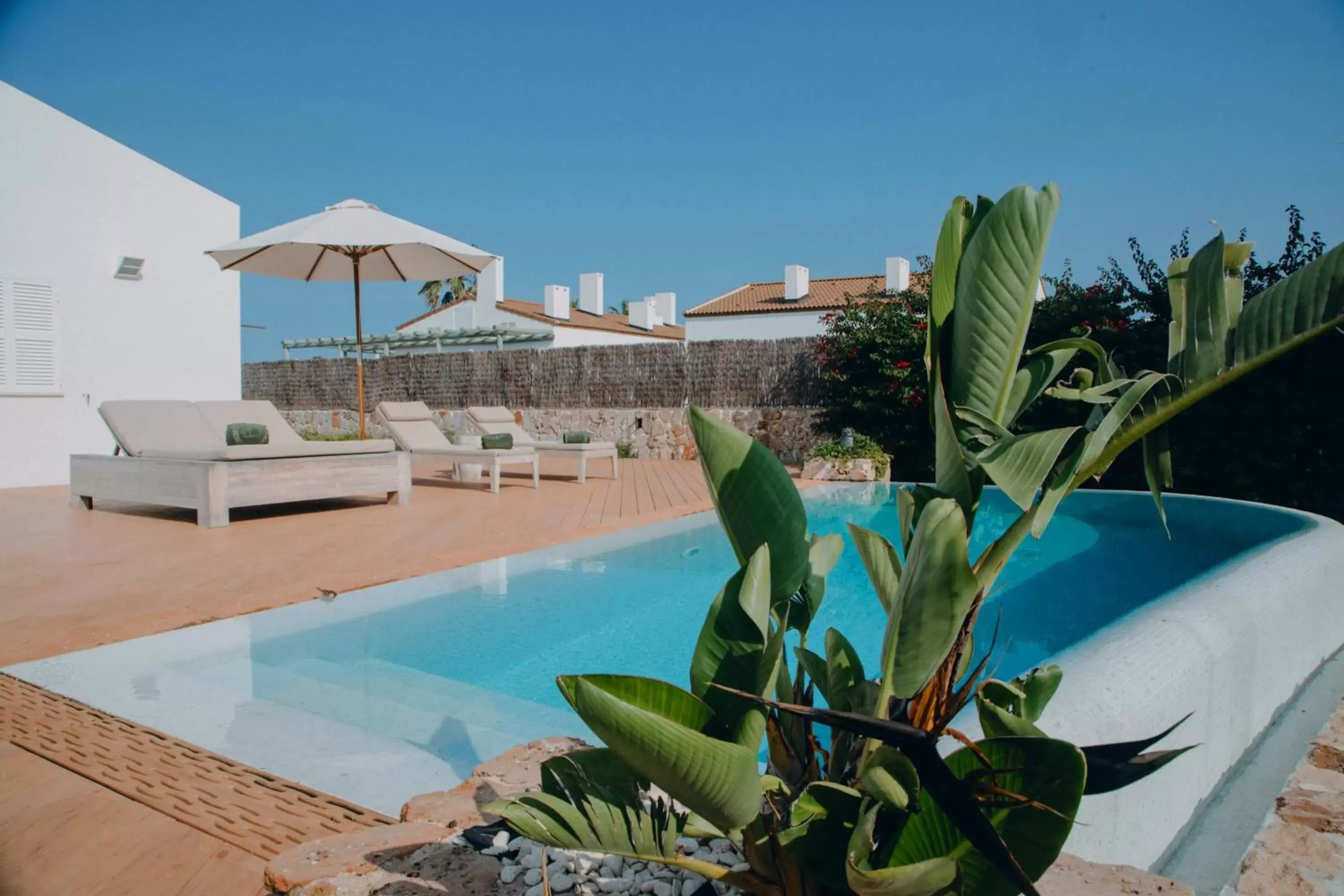 Patio, Swimming Pool in Lago Resort Menorca - Villas & Bungalows del Lago