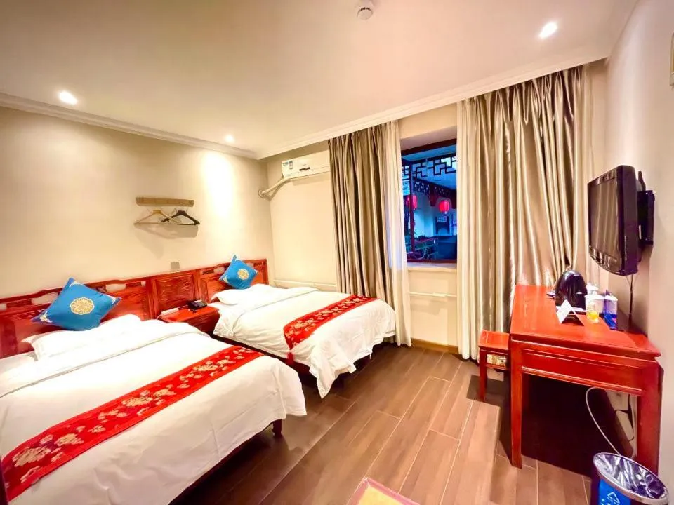 Bed in Beijing Hyde Courtyard Hotel