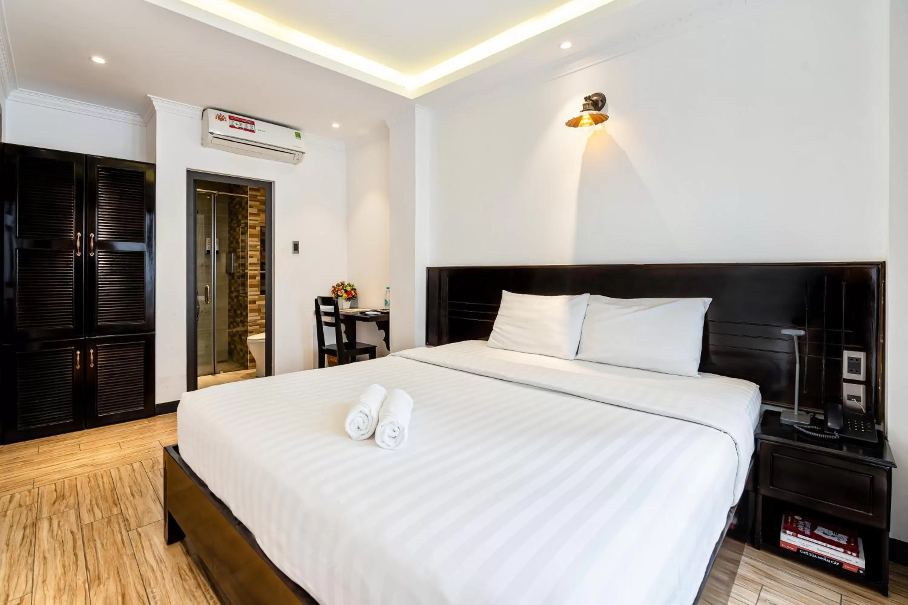 Bed in Lotus Laverne Hotel