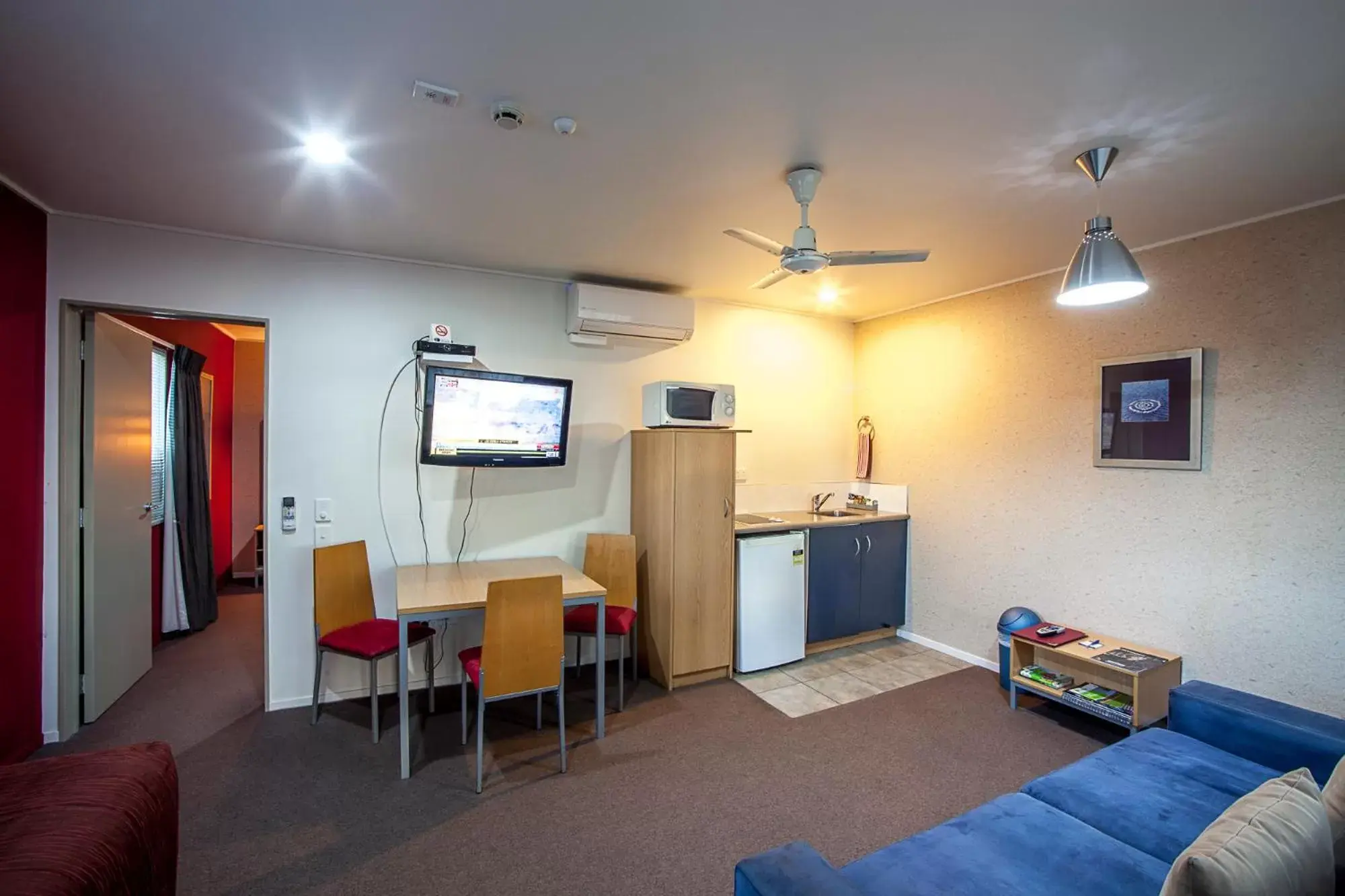 Living room, TV/Entertainment Center in Landmark Manor