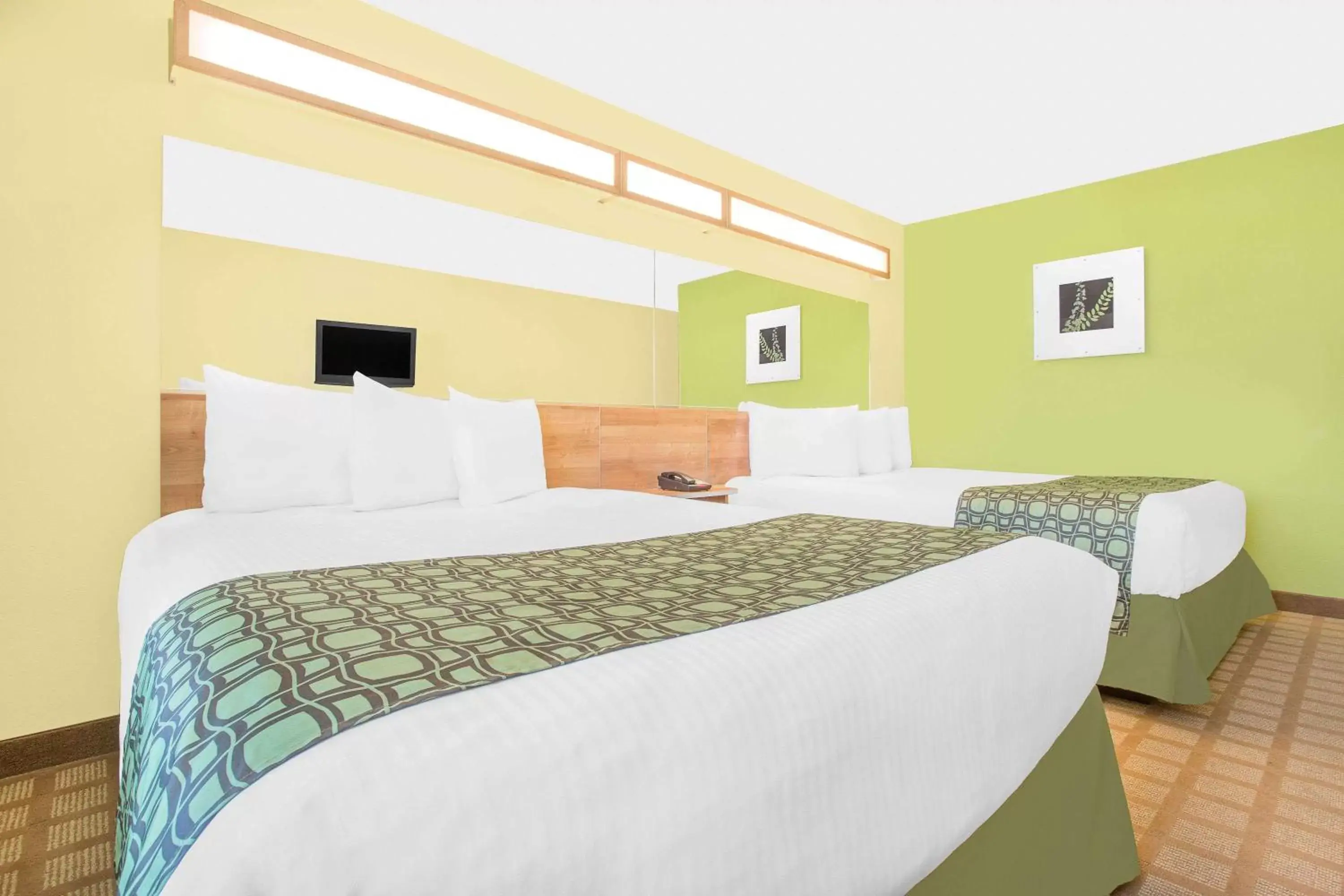 Photo of the whole room, Bed in Microtel Inn & Suites by Wyndham Tuscumbia/Muscle Shoals Photo of the whole room, Bed in Microtel Inn & Suites by Wyndham Tuscumbia/Muscle Shoals