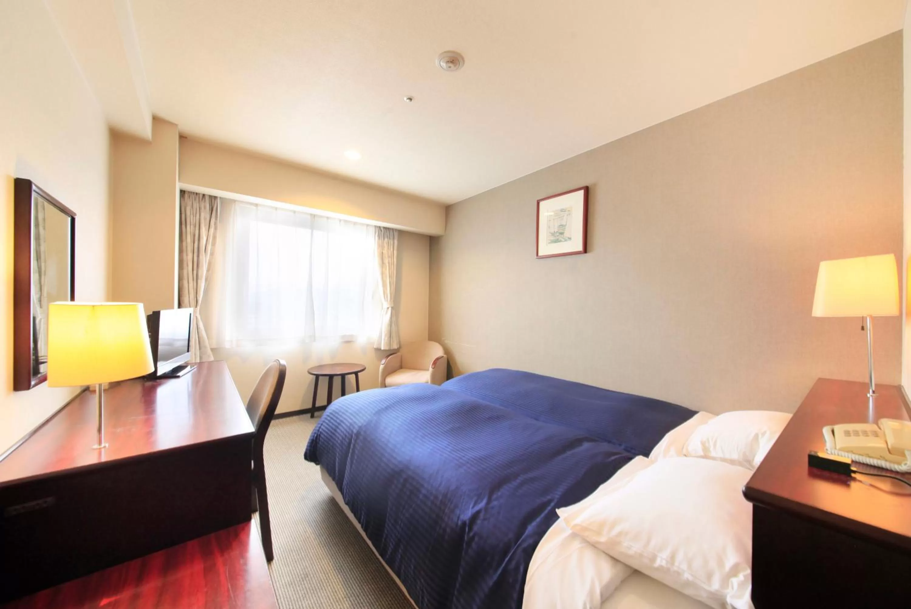 Photo of the whole room, Bed in Quintessa Hotel Ogaki