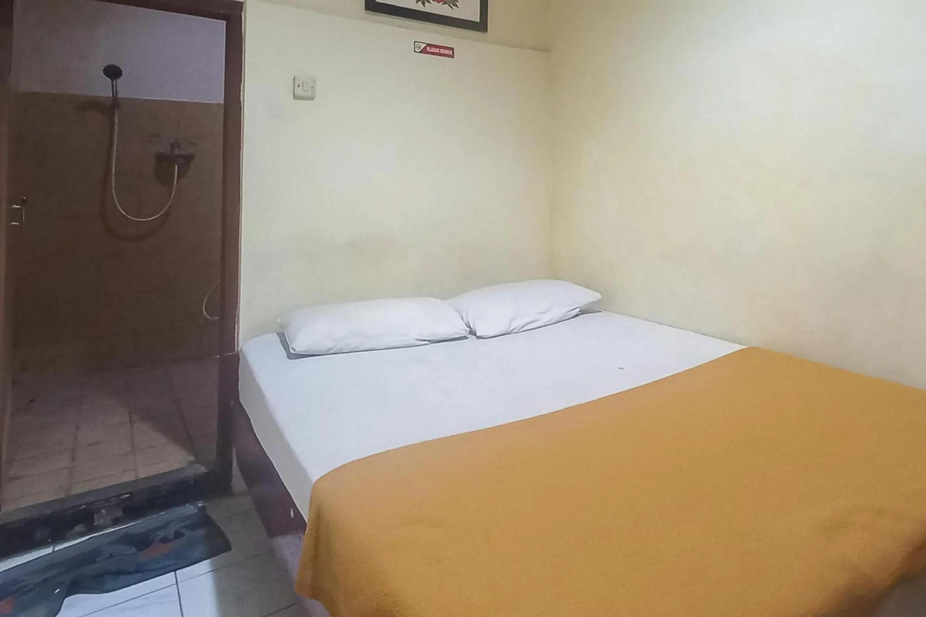 Bed in Hotel Malang near Alun Alun Malang RedPartner