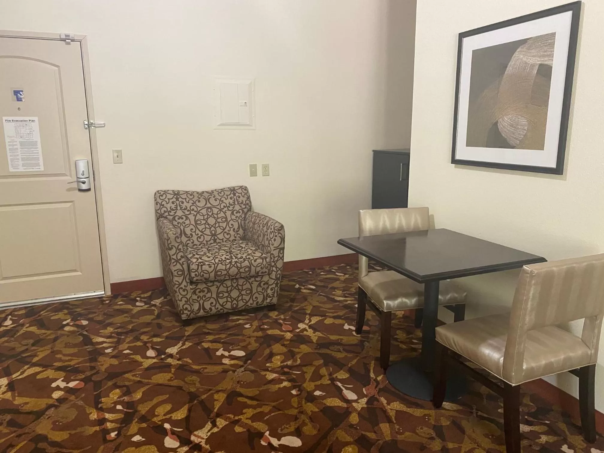 Living room in Baymont by Wyndham Hobbs