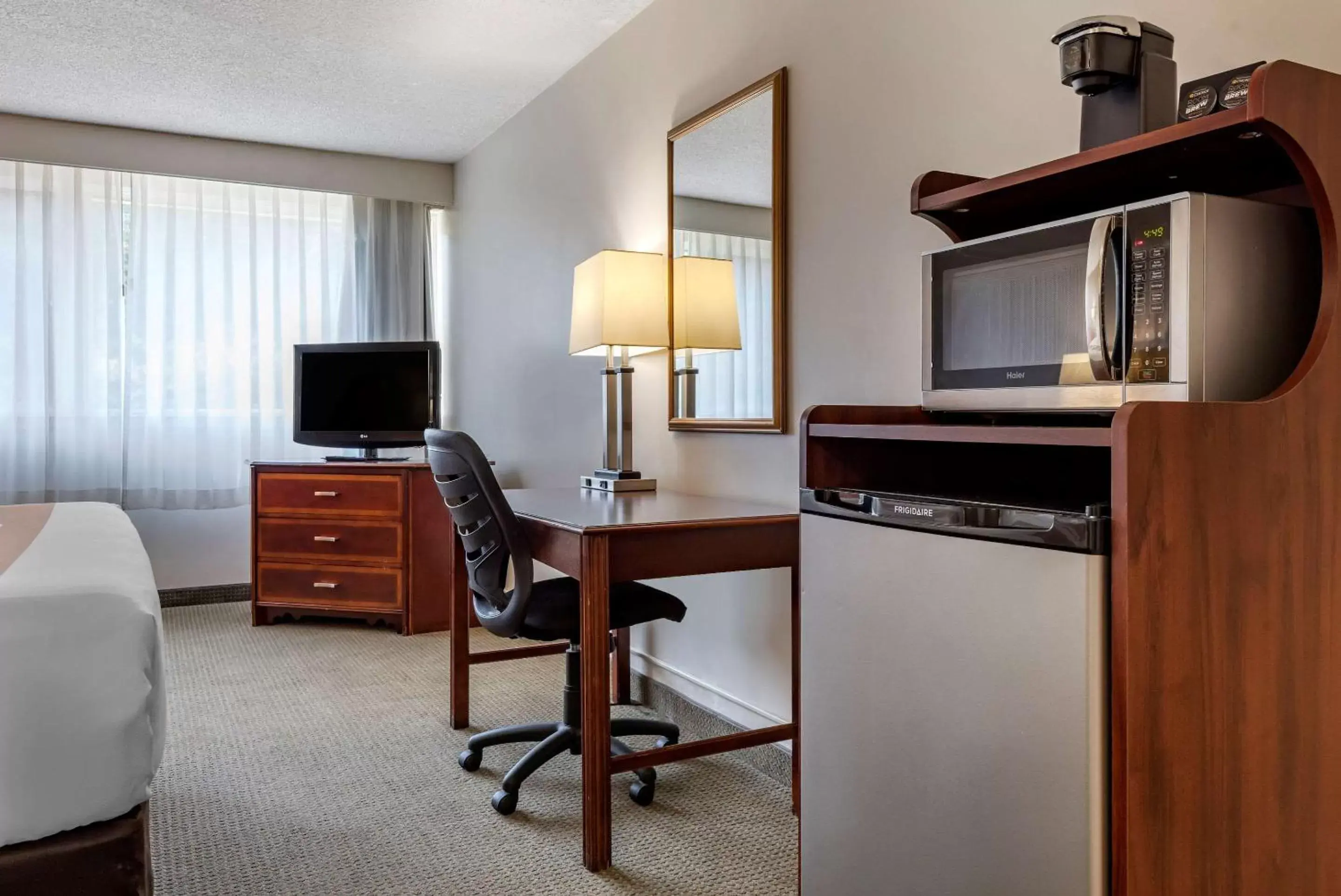 Photo of the whole room, TV/Entertainment Center in Quality Inn & Suites Vestal Binghamton near University