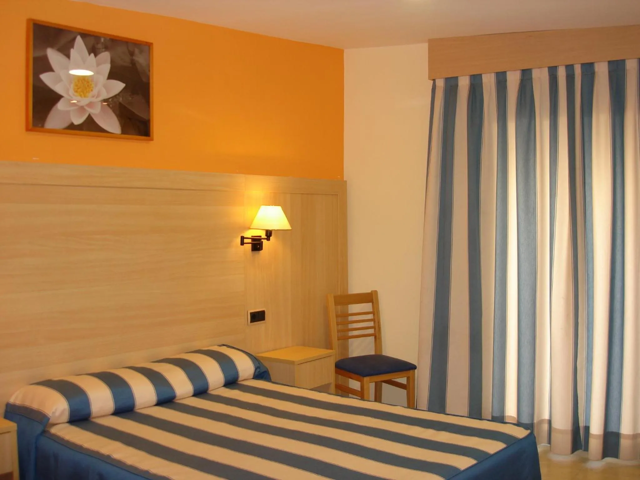 Bed in Hotel Cantón