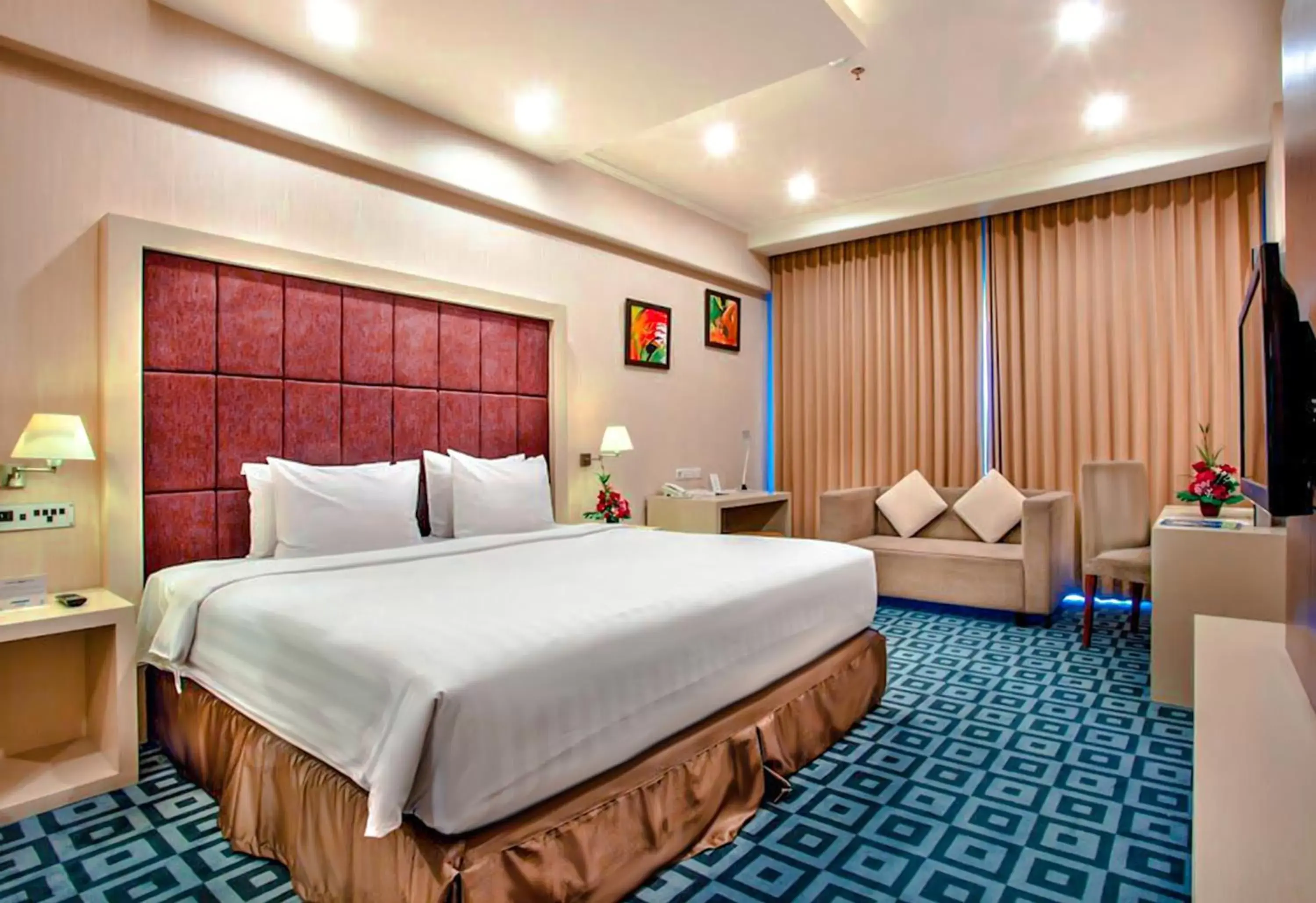 Bedroom, Bed in Surabaya Suites Hotel Powered by Archipelago Bedroom, Bed in Surabaya Suites Hotel Powered by Archipelago
