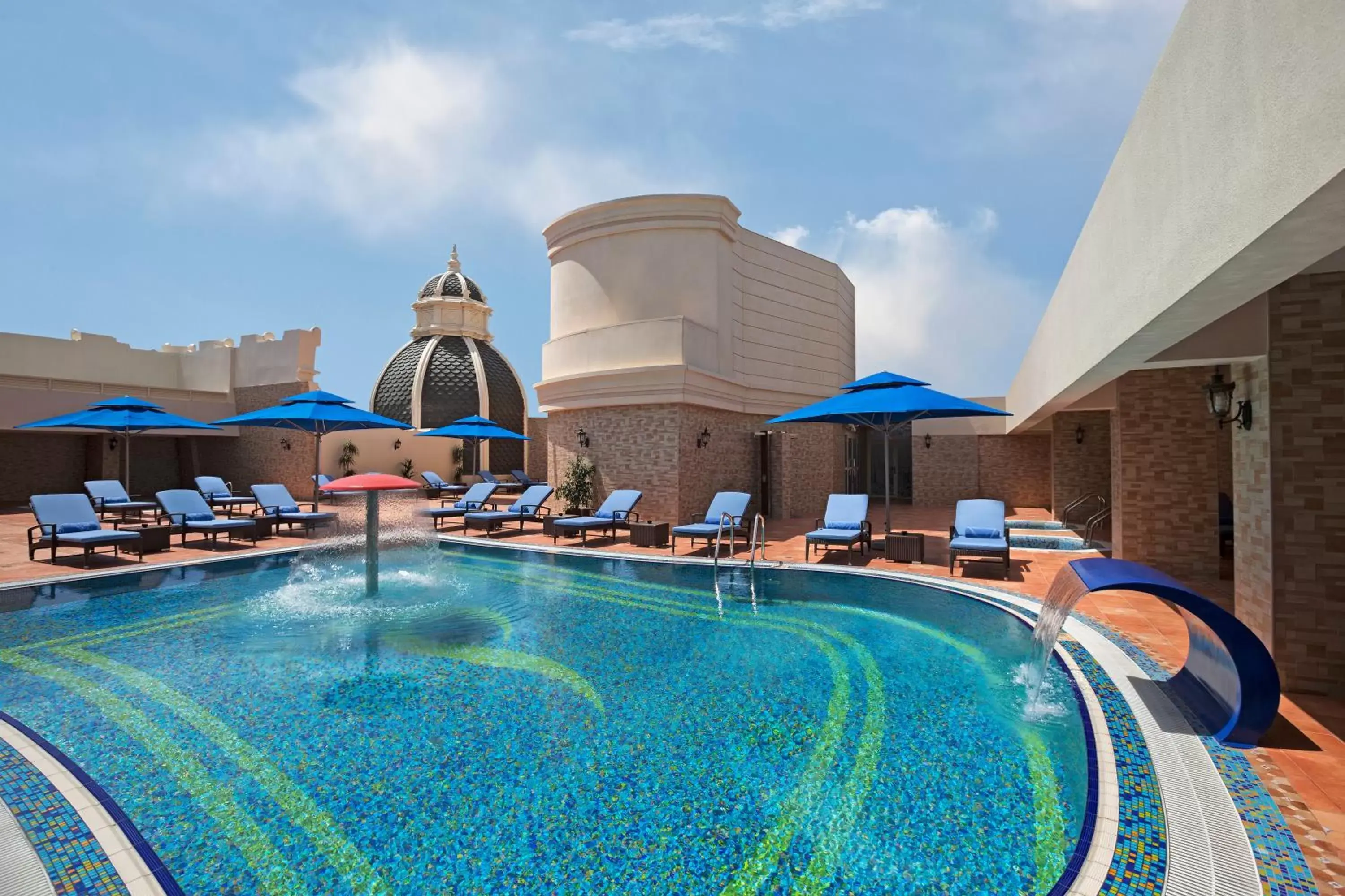 Swimming pool in Royal Rose Abu Dhabi, a Curio Collection by Hilton Affiliated Hotel Swimming pool in Royal Rose Abu Dhabi, a Curio Collection by Hilton Affiliated Hotel