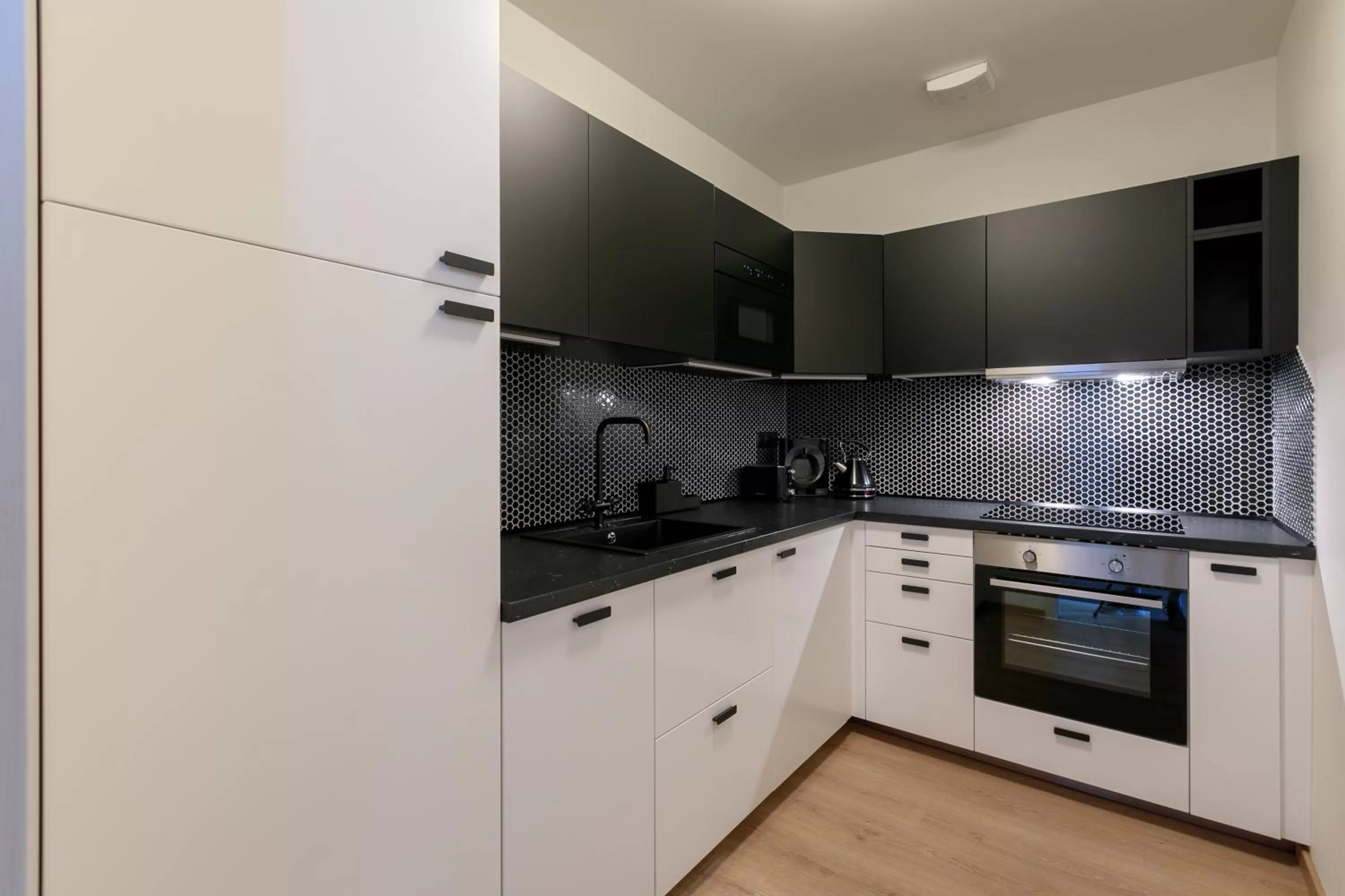 Kitchen or kitchenette in Avantgarde apartments