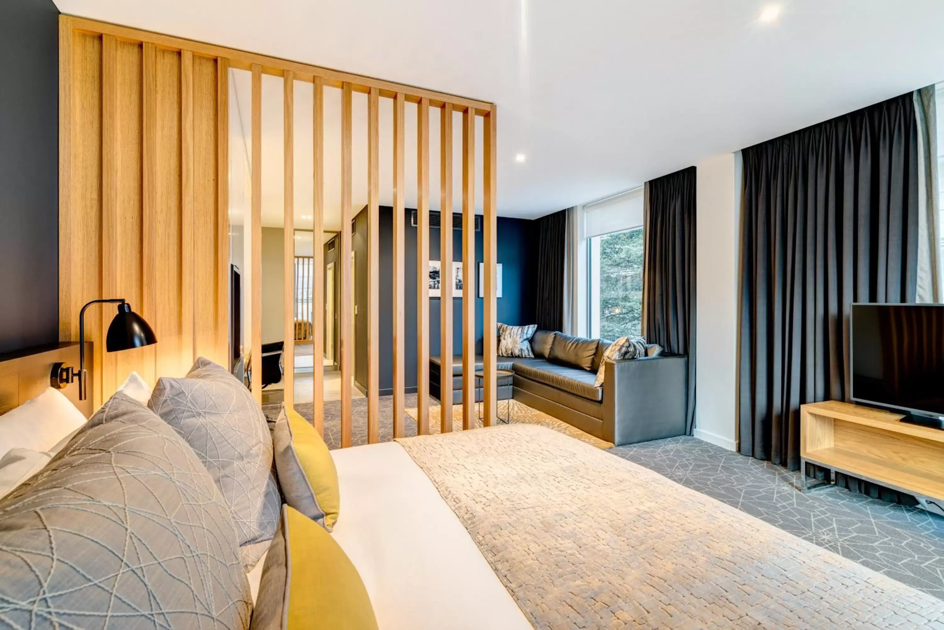 Bedroom, Seating Area in Apex City of Bath Hotel