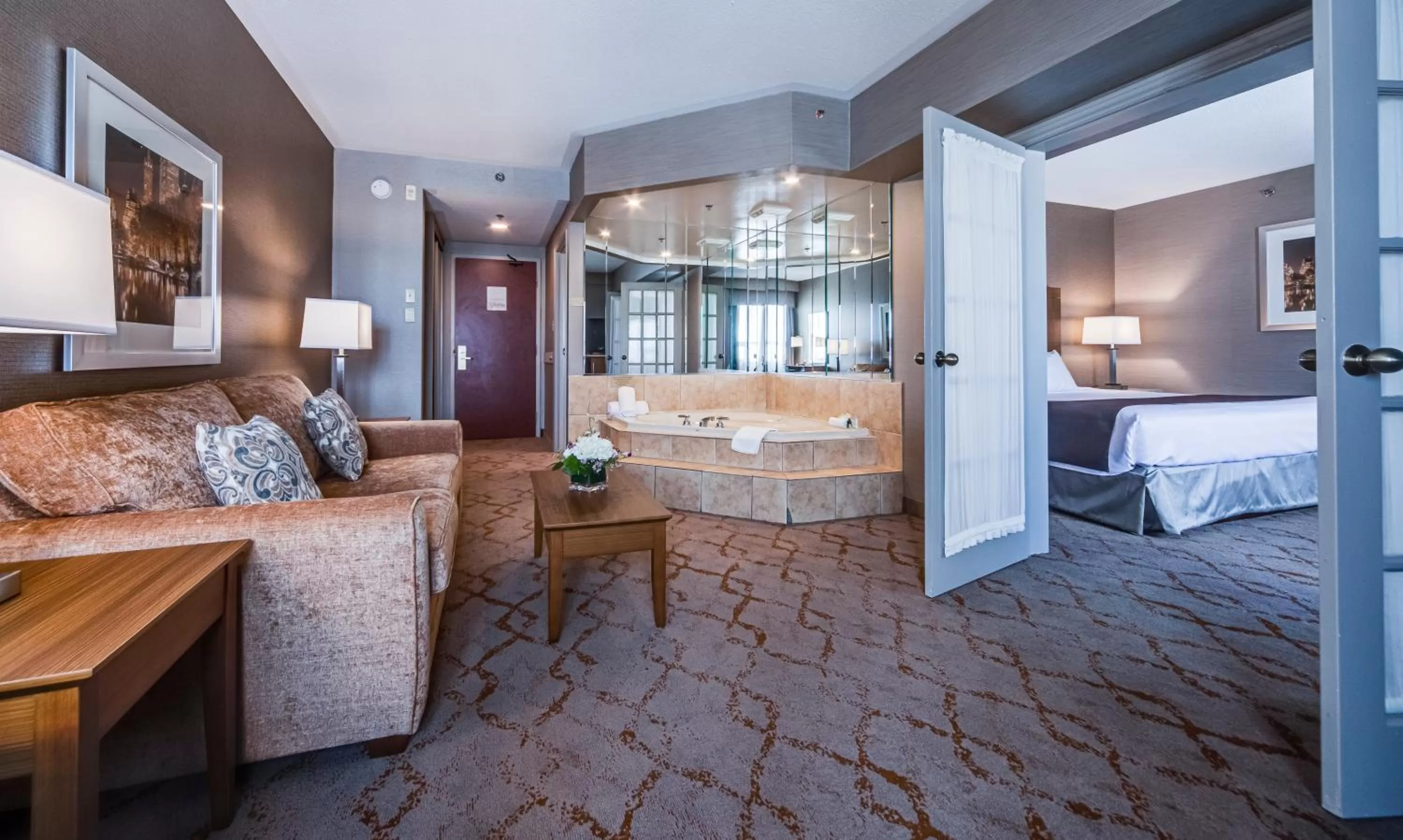 Bed in Monte Carlo Inn Vaughan Suites