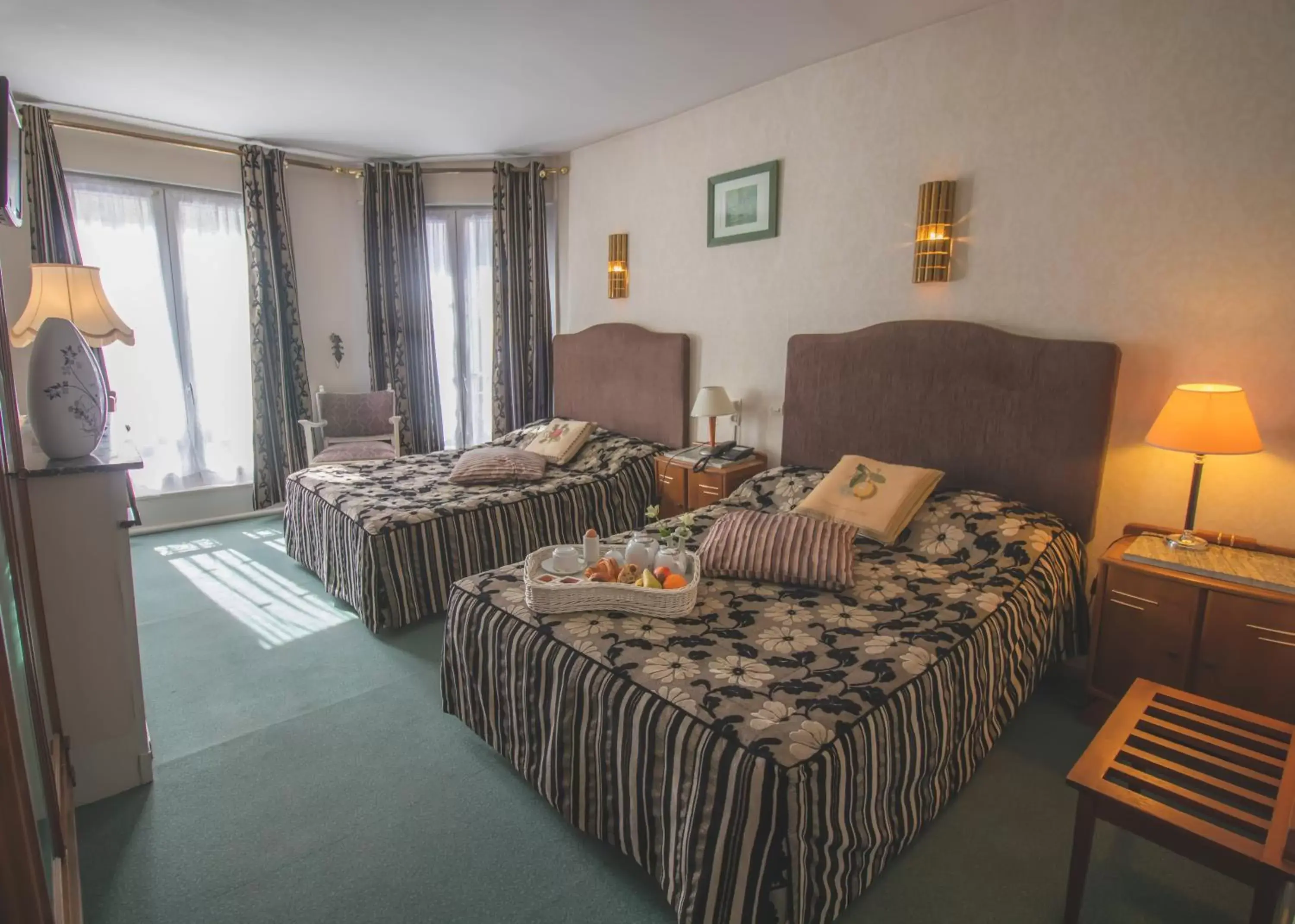 Photo of the whole room, Bed in Hôtel De La Banniere De France