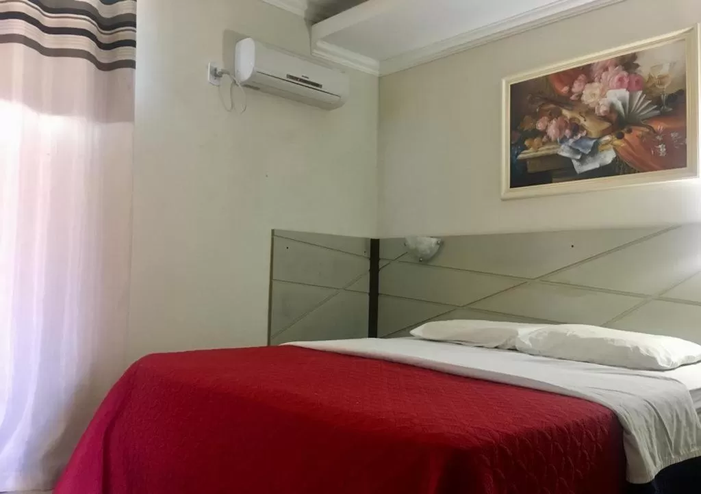 Bed in Hotel Solar Flores