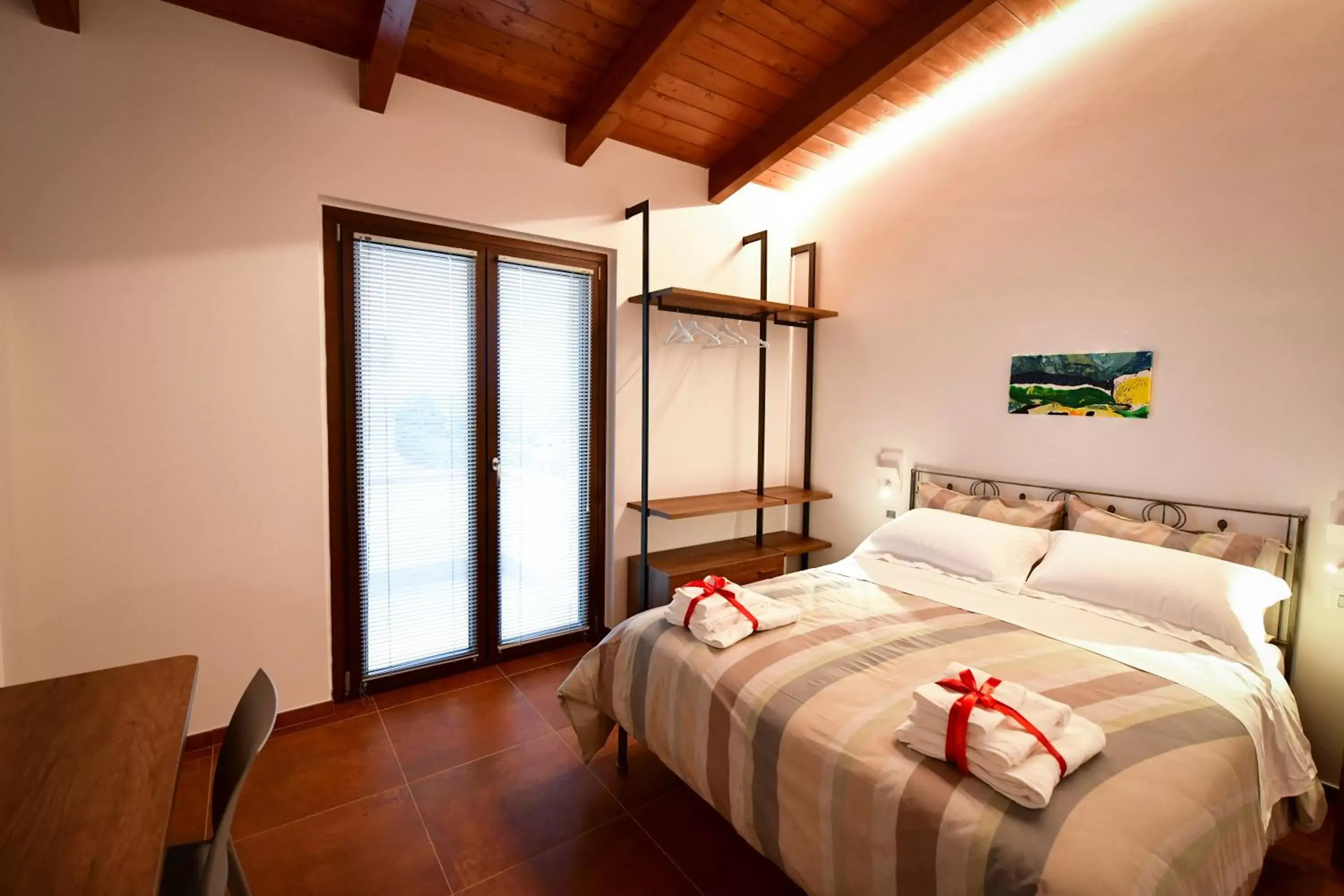 Bed in IL CAMBUSIERE nature relais