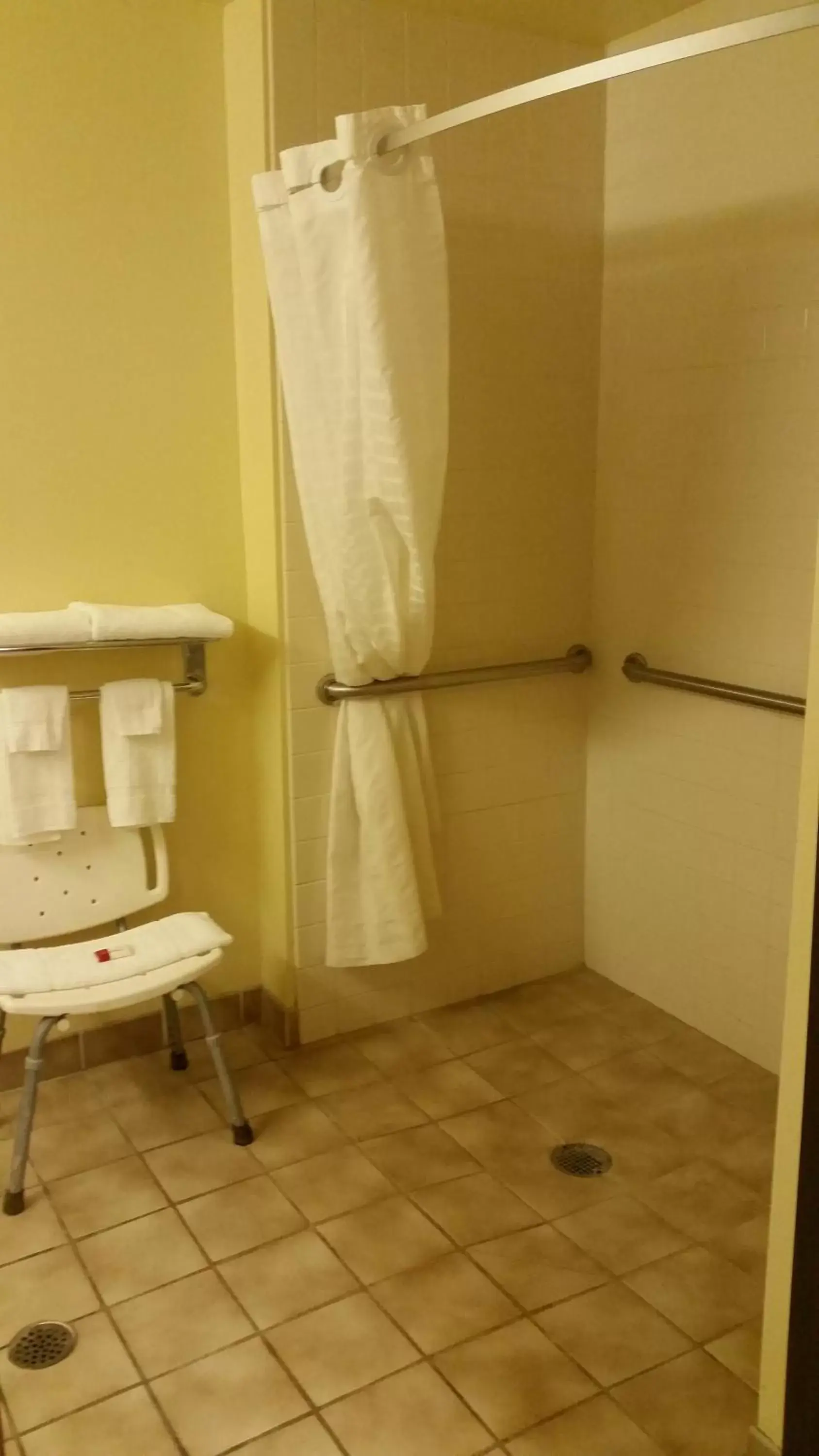 Bathroom in Super 8 by Wyndham Wheeling St Clairsville OH Area