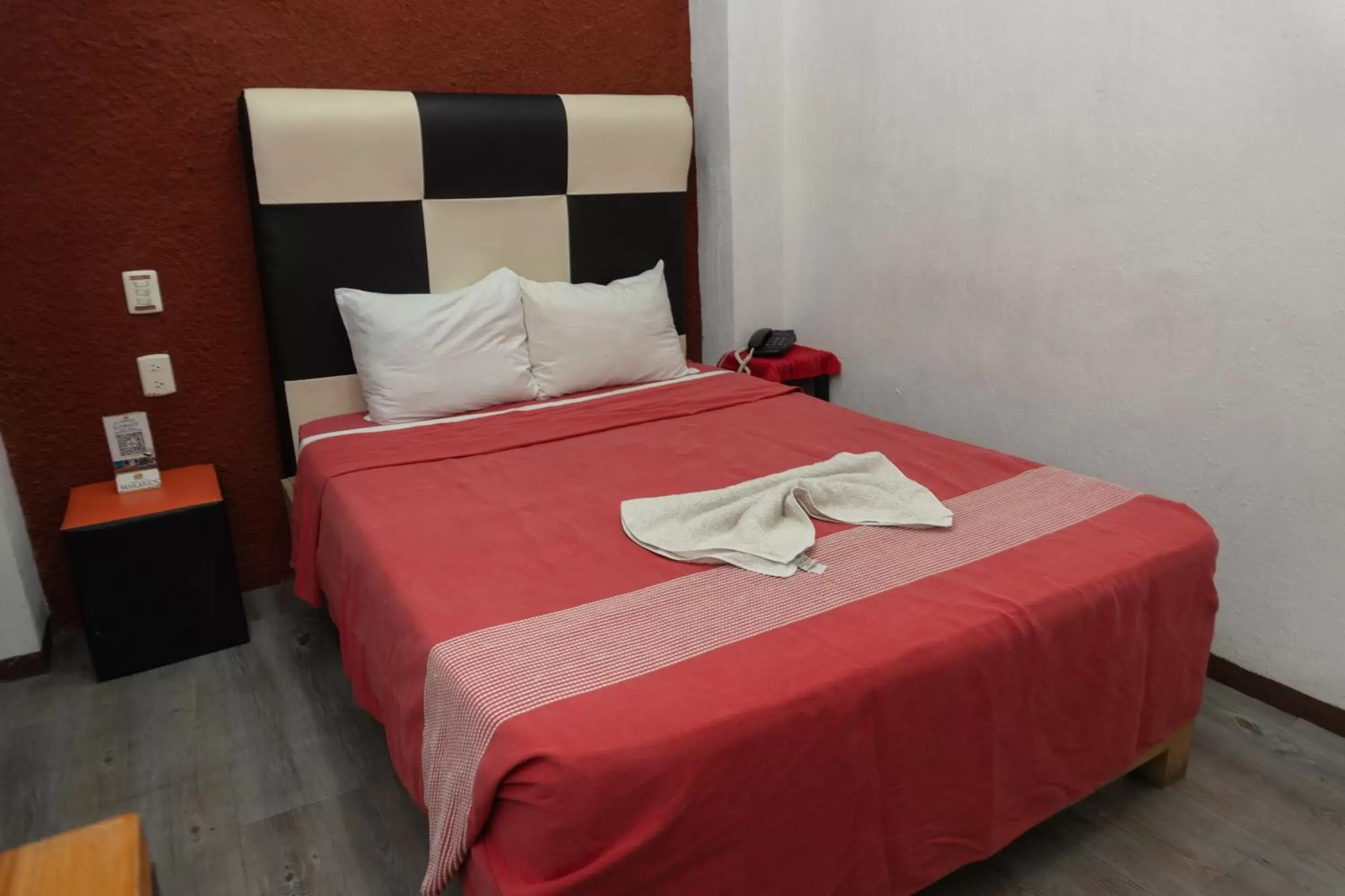 Bed in Hotel Makarios