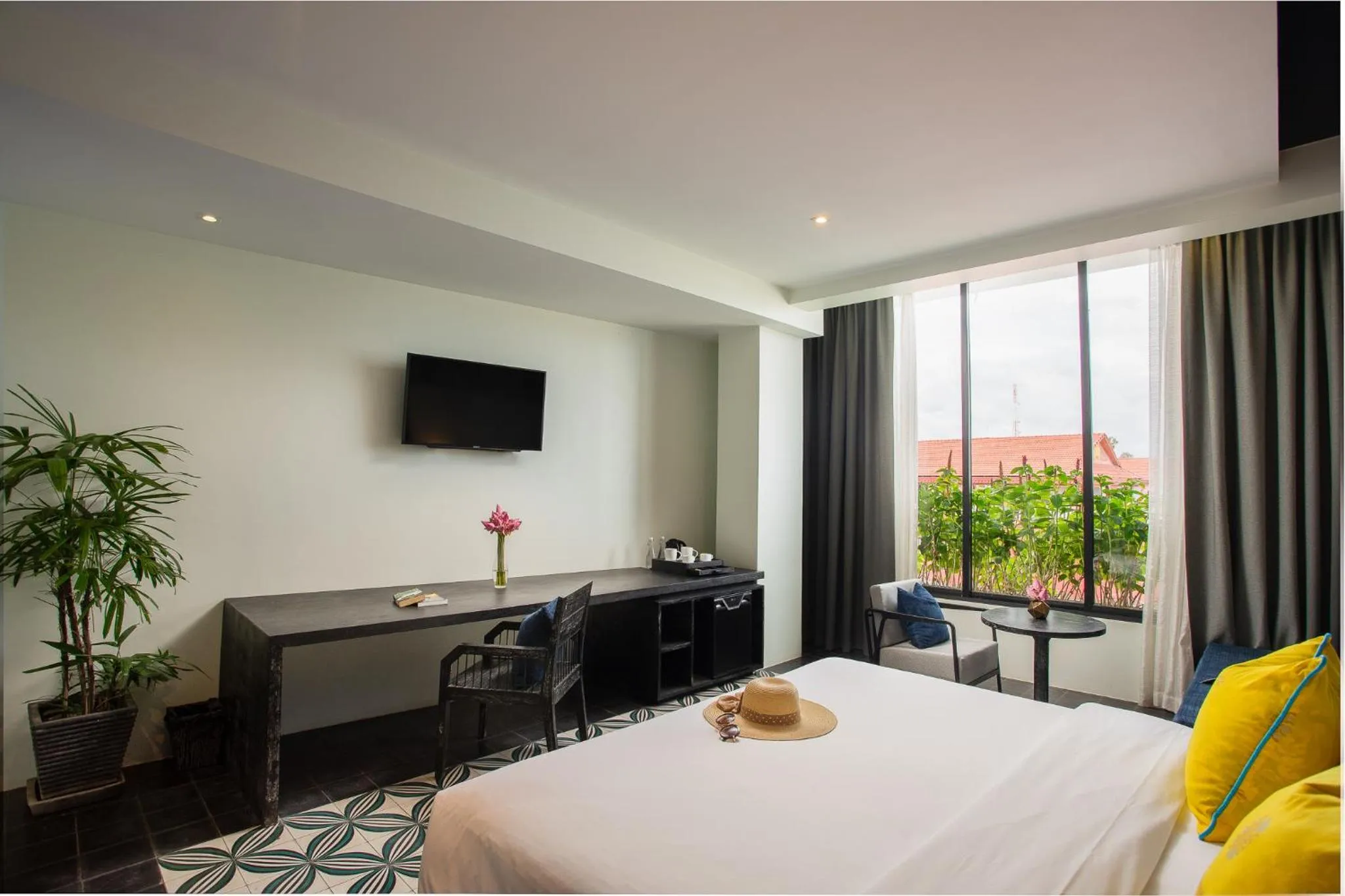 Living room, Bed in Monthara Angkor Residence