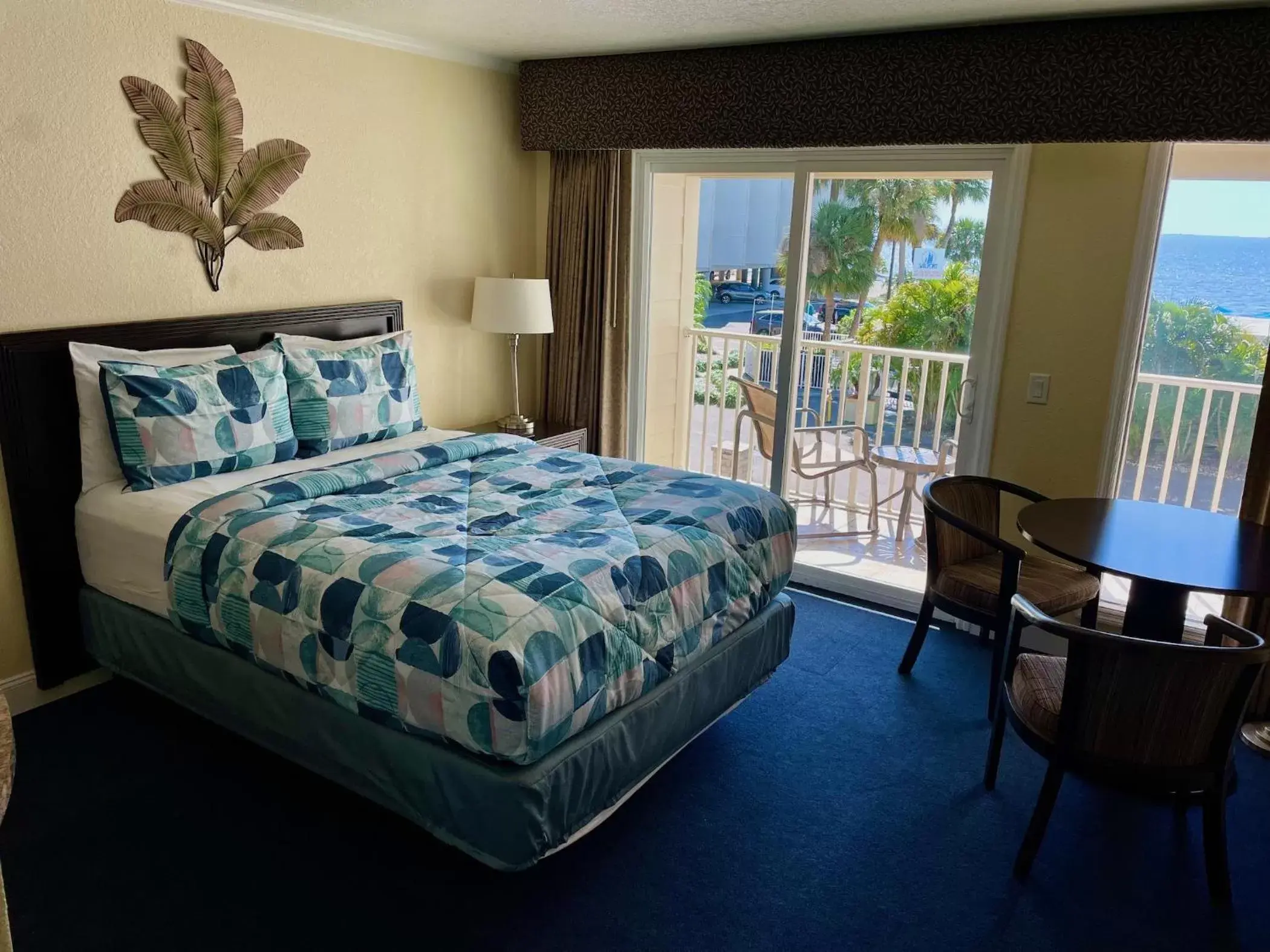 Bed in 2 Bed Condo with Balcony Facing Pool and Sunsets!