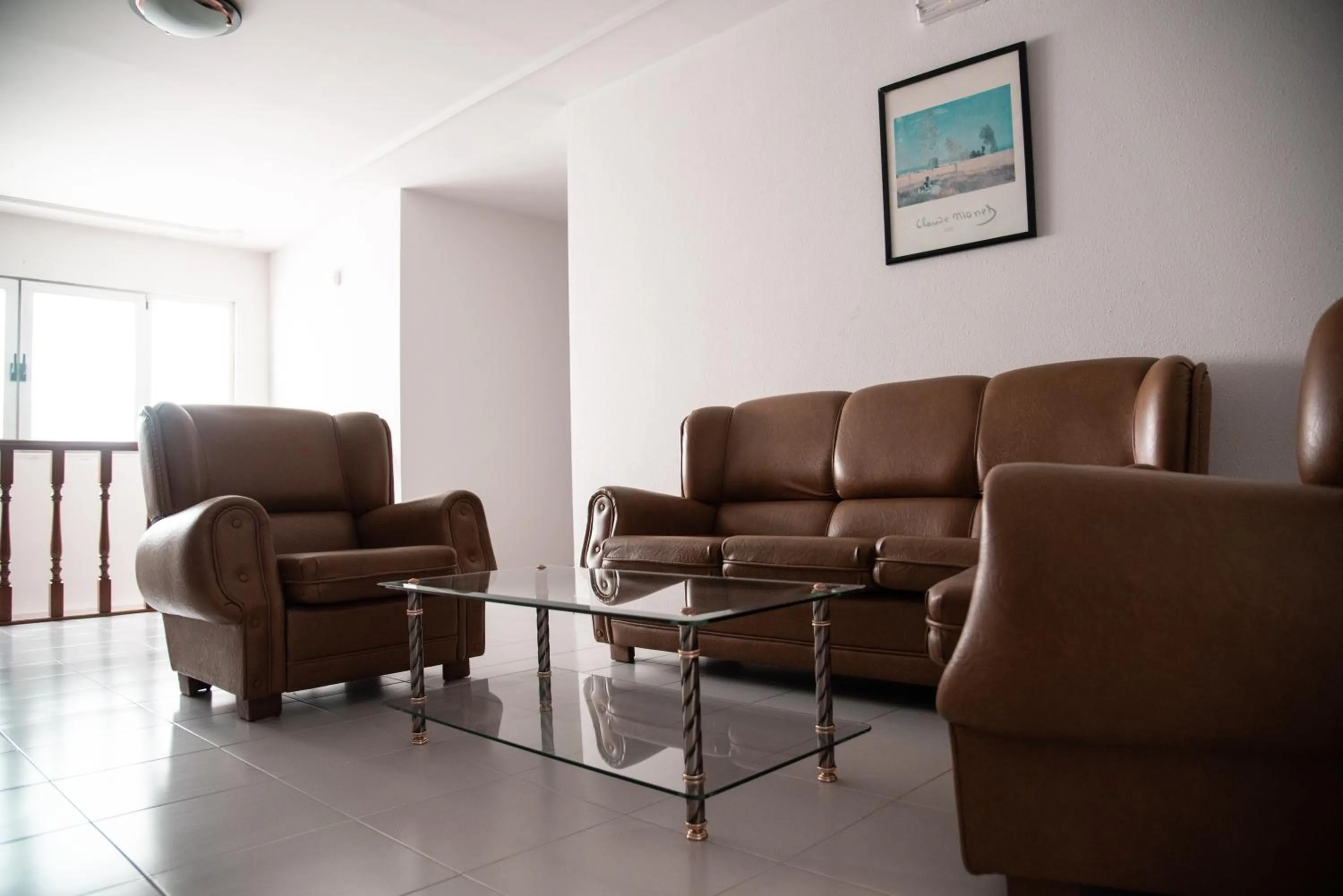 Communal lounge/ TV room in Hotel Los Olmos