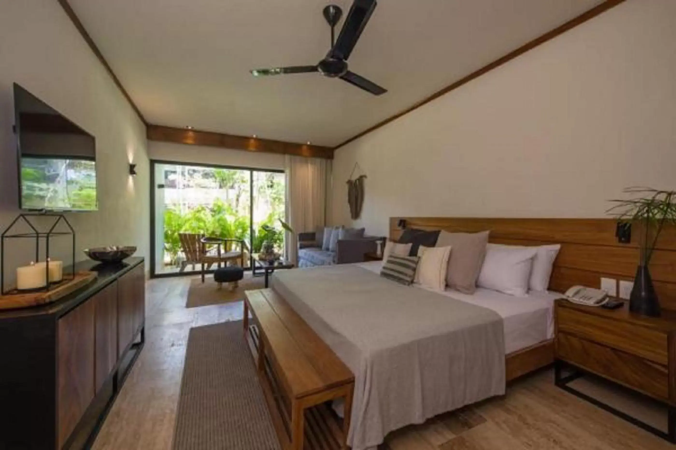 Bed in Kimpton Aluna Resort Tulum, an IHG Hotel