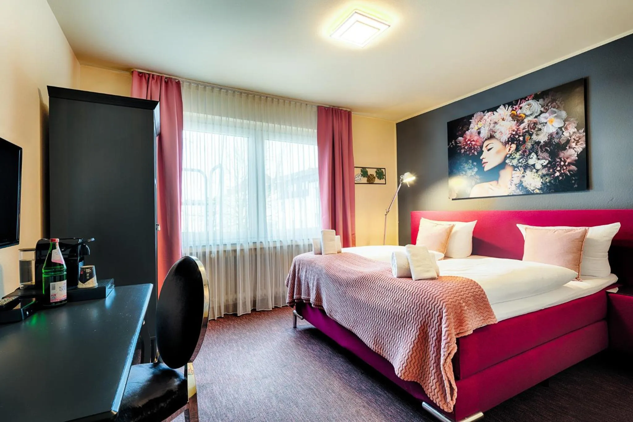 Communal lounge/ TV room, Bed in Hotel Fürst Garden