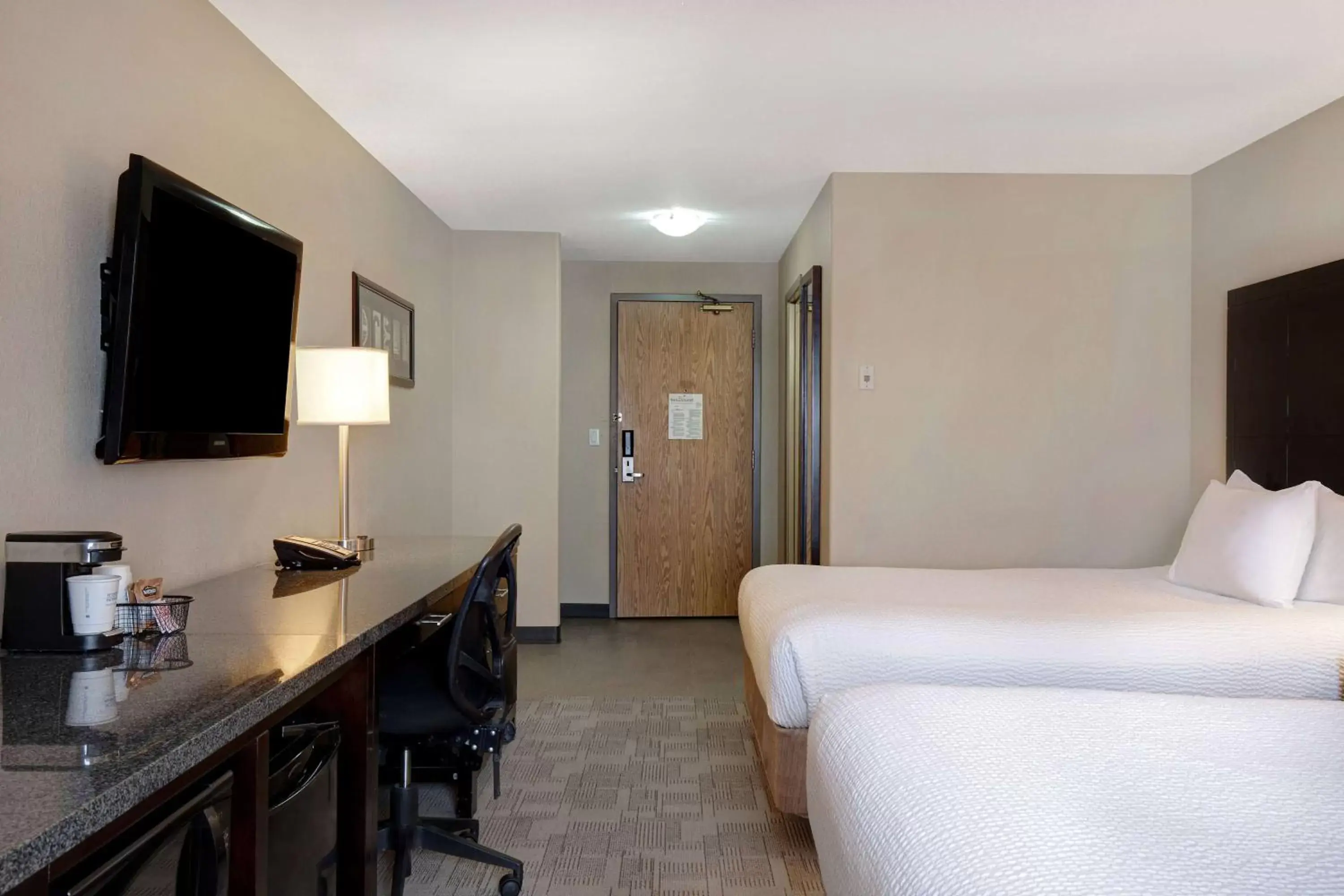 Photo of the whole room, TV/Entertainment Center in Days Inn by Wyndham Medicine Hat