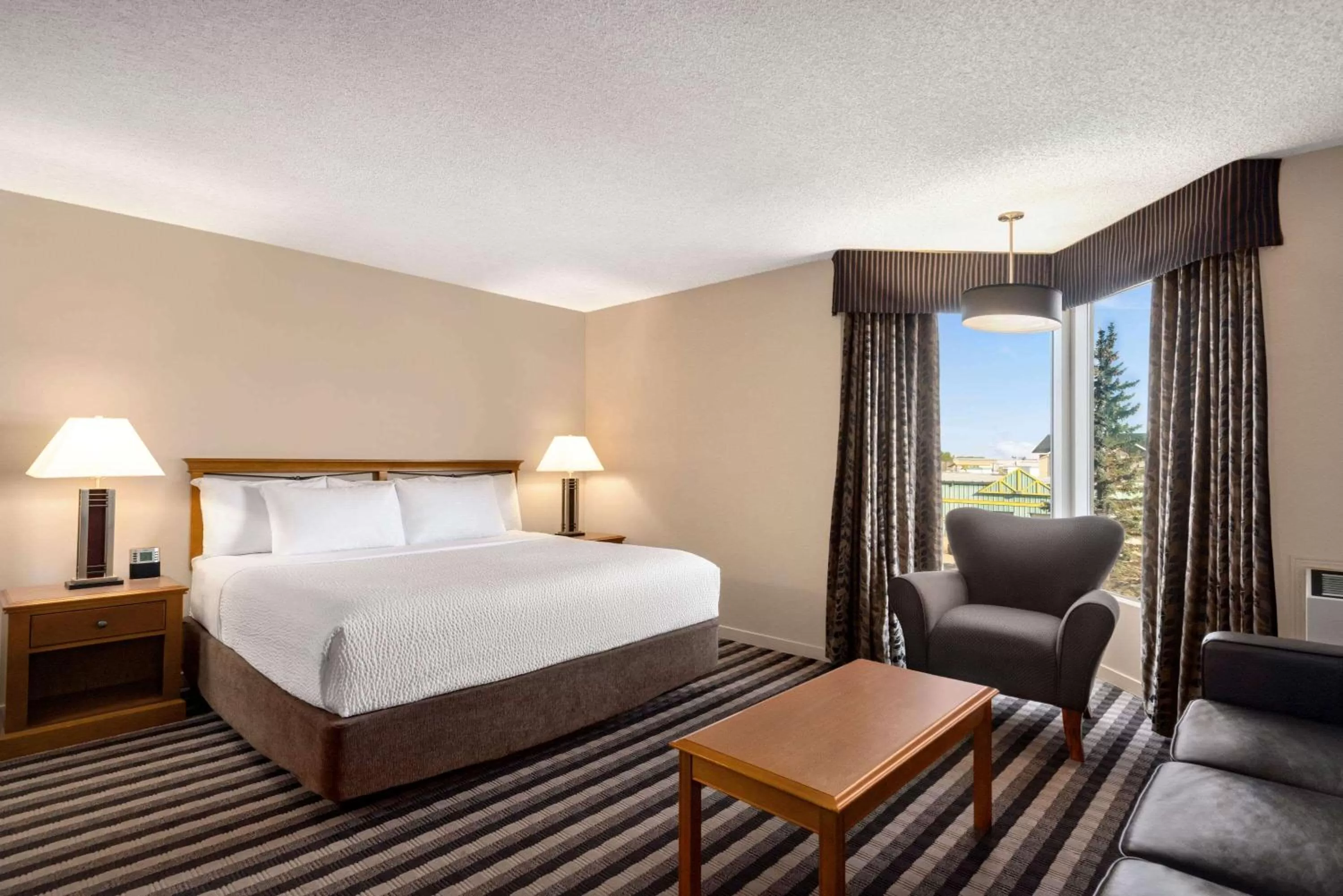 Photo of the whole room, Bed in Royal Hotel West Edmonton, Trademark Collection by Wyndham