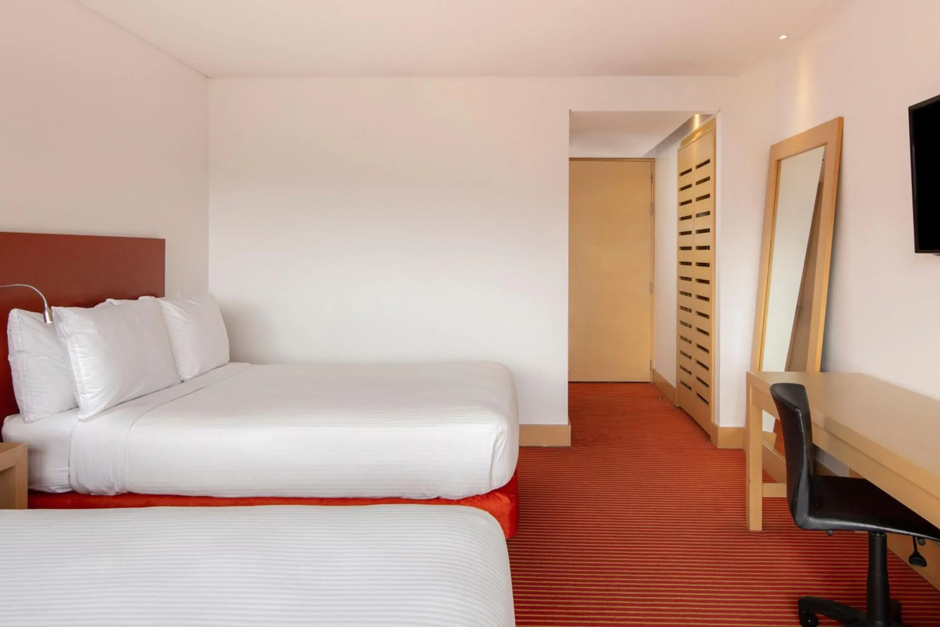 Photo of the whole room, Bed in Fairfield by Marriott Bogota Embajada