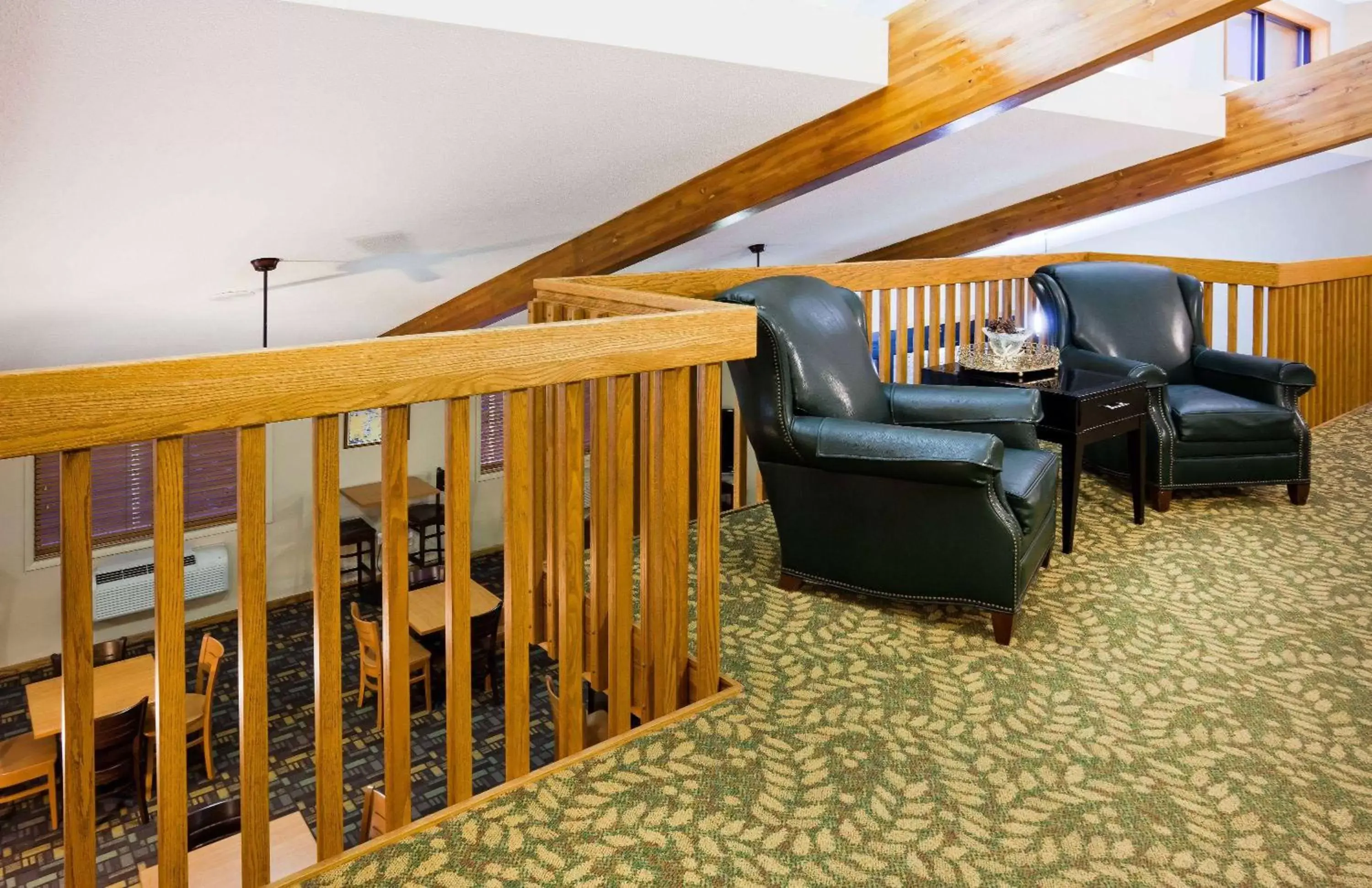 Seating area in AmericInn by Wyndham Ironwood