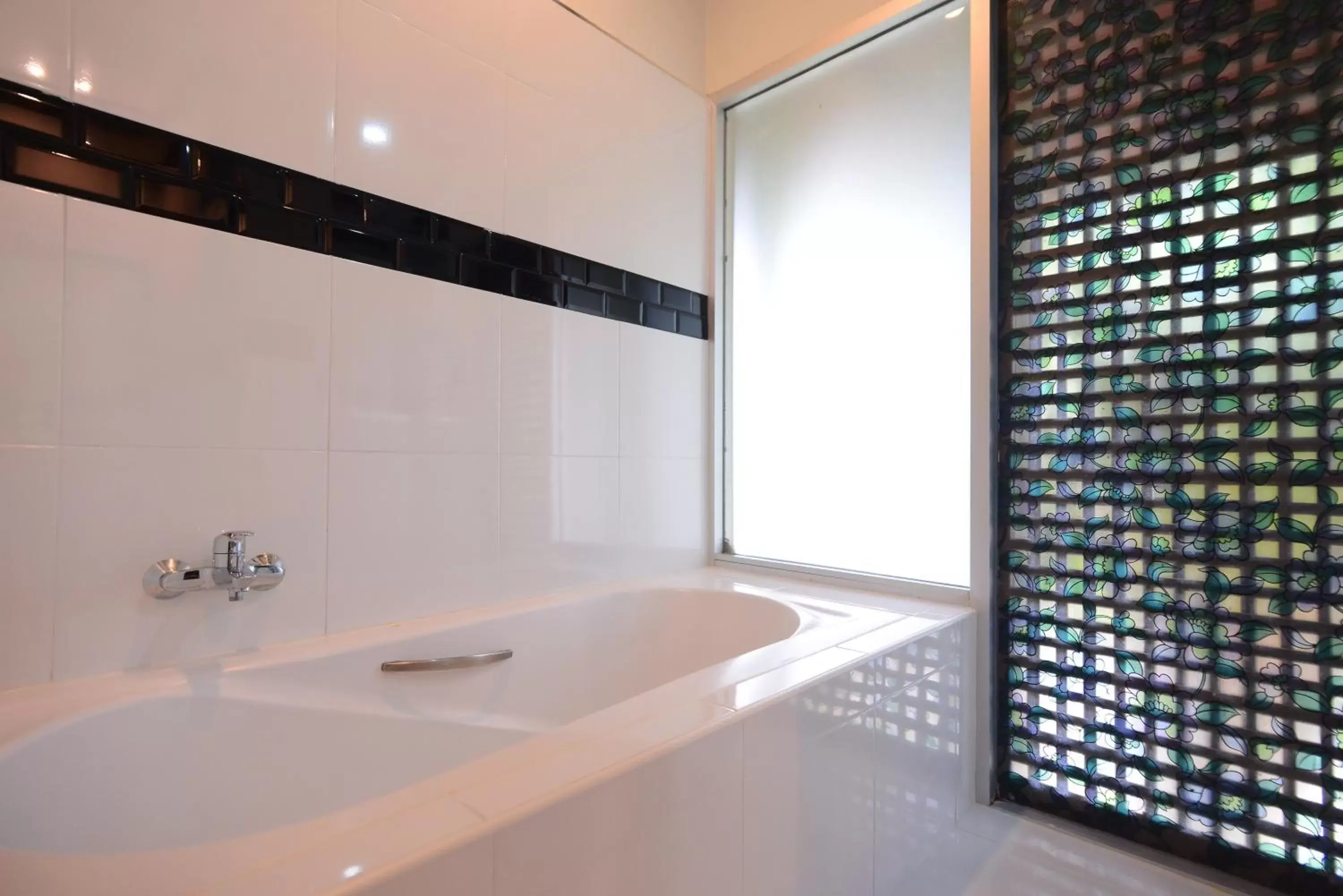 Bathroom in Royal River Kwai Resort and Spa -SHA Extra Plus
