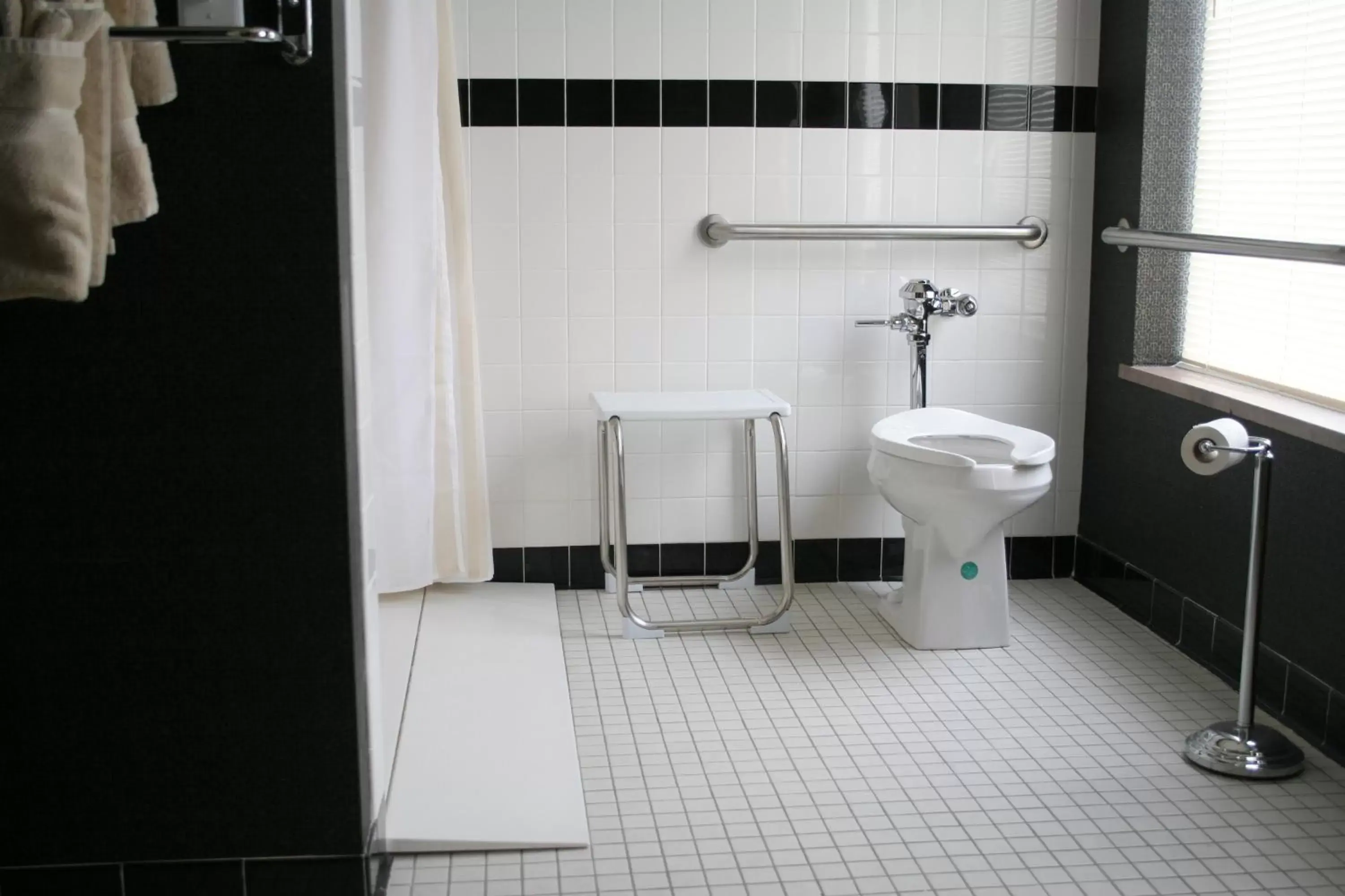 Toilet, Bathroom in Ambassador Hotel Milwaukee, Trademark Collection by Wyndham
