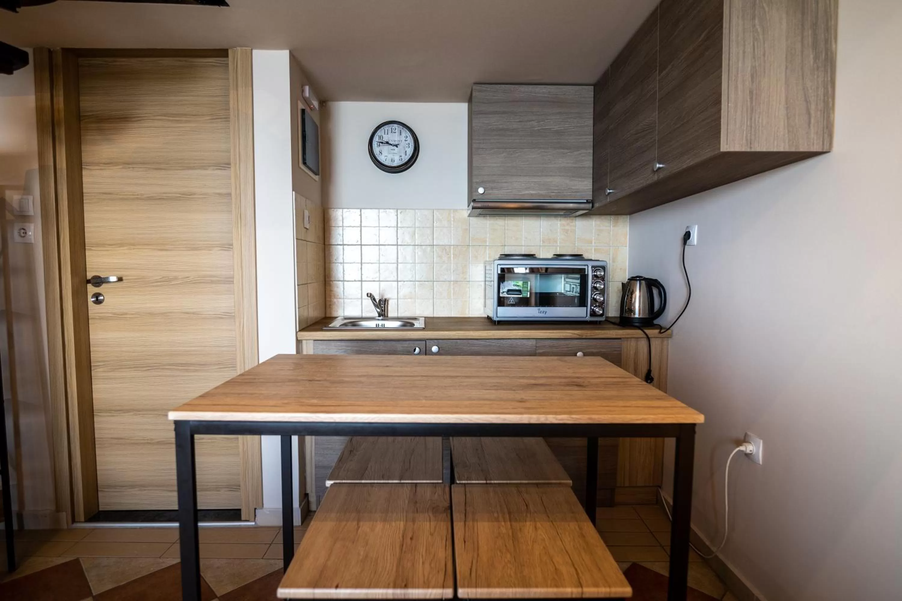 Kitchen or kitchenette in Votsalakia Hotel & Luxury Apartments