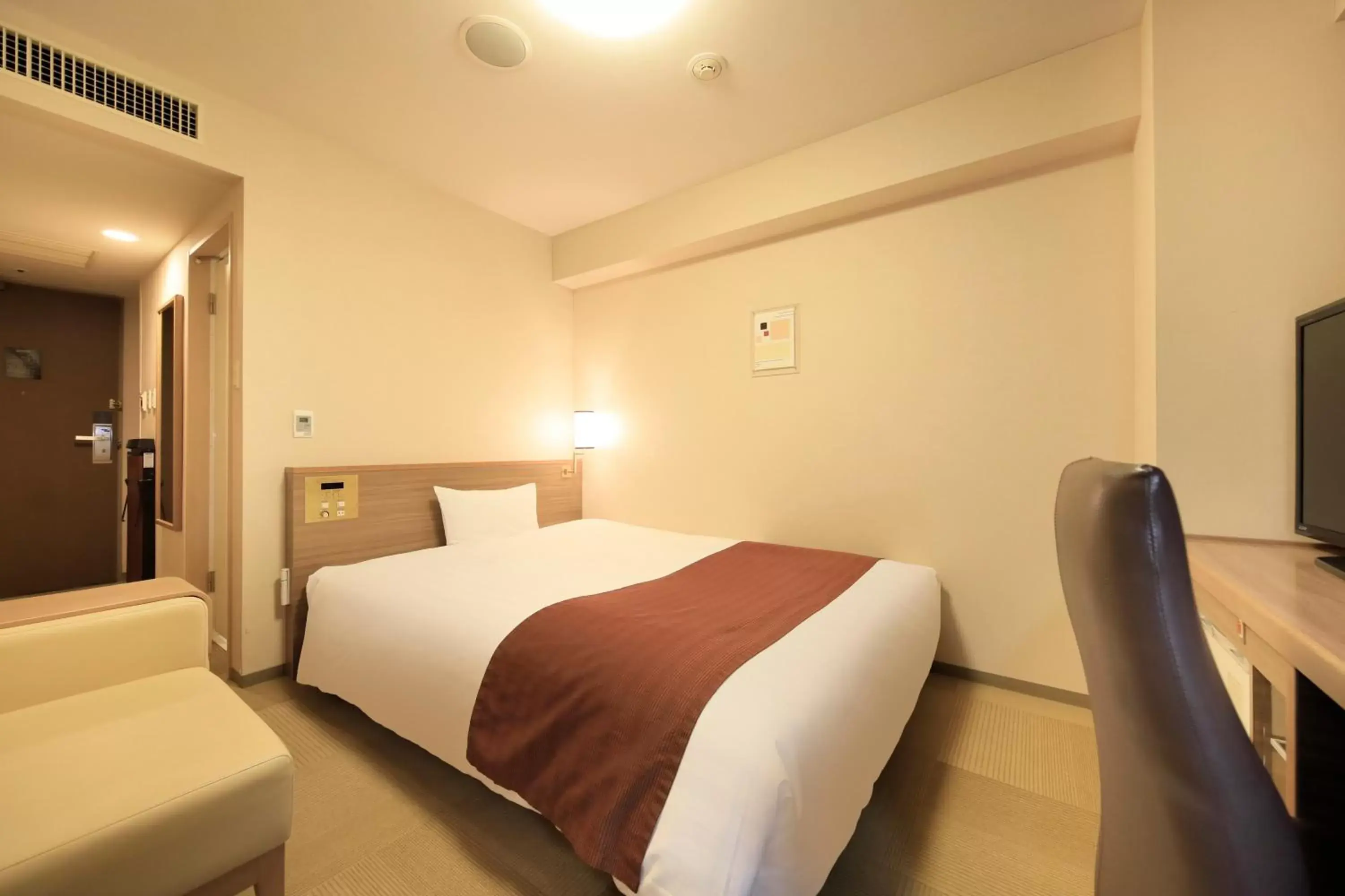 Bed in Daiwa Roynet Hotel Hachinohe