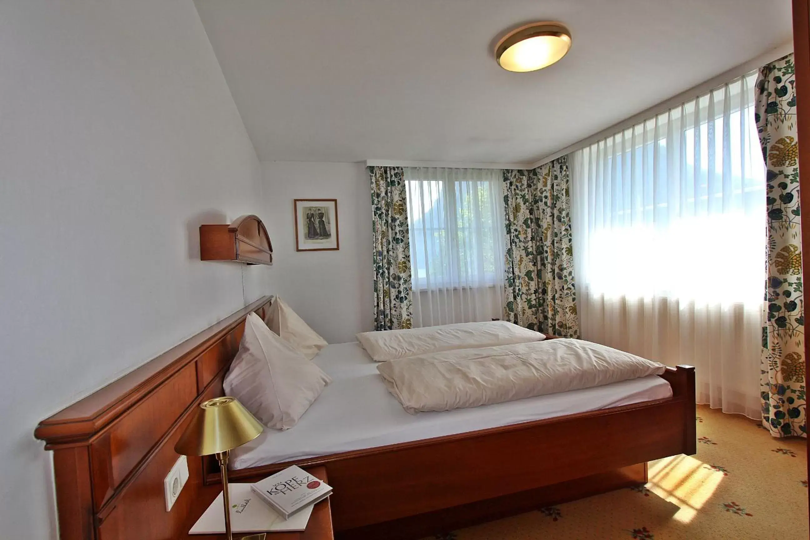 Photo of the whole room, Bed in Landhotel Post Ebensee am Traunsee ***S