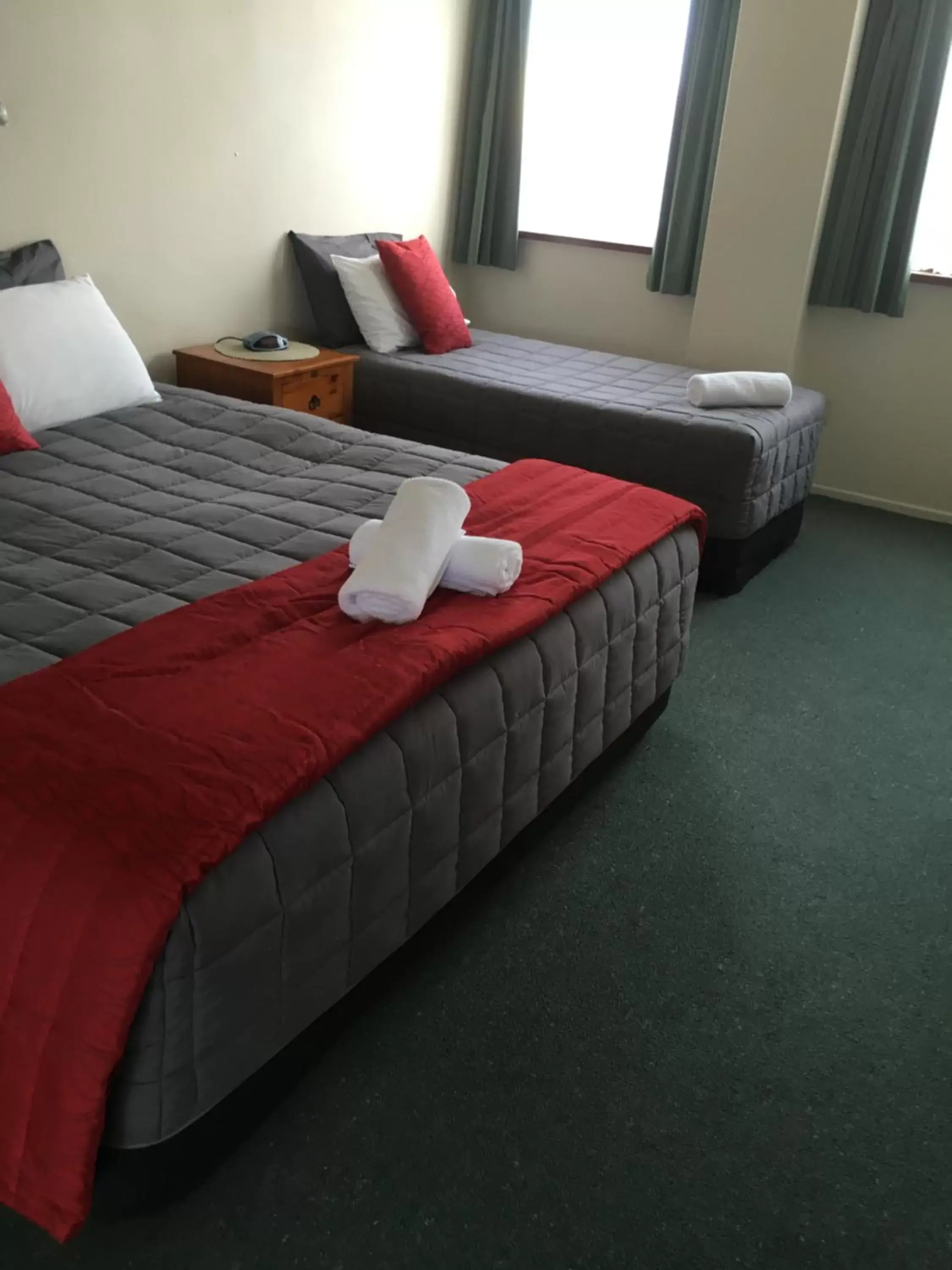 Bed in Ascot Oamaru Motel